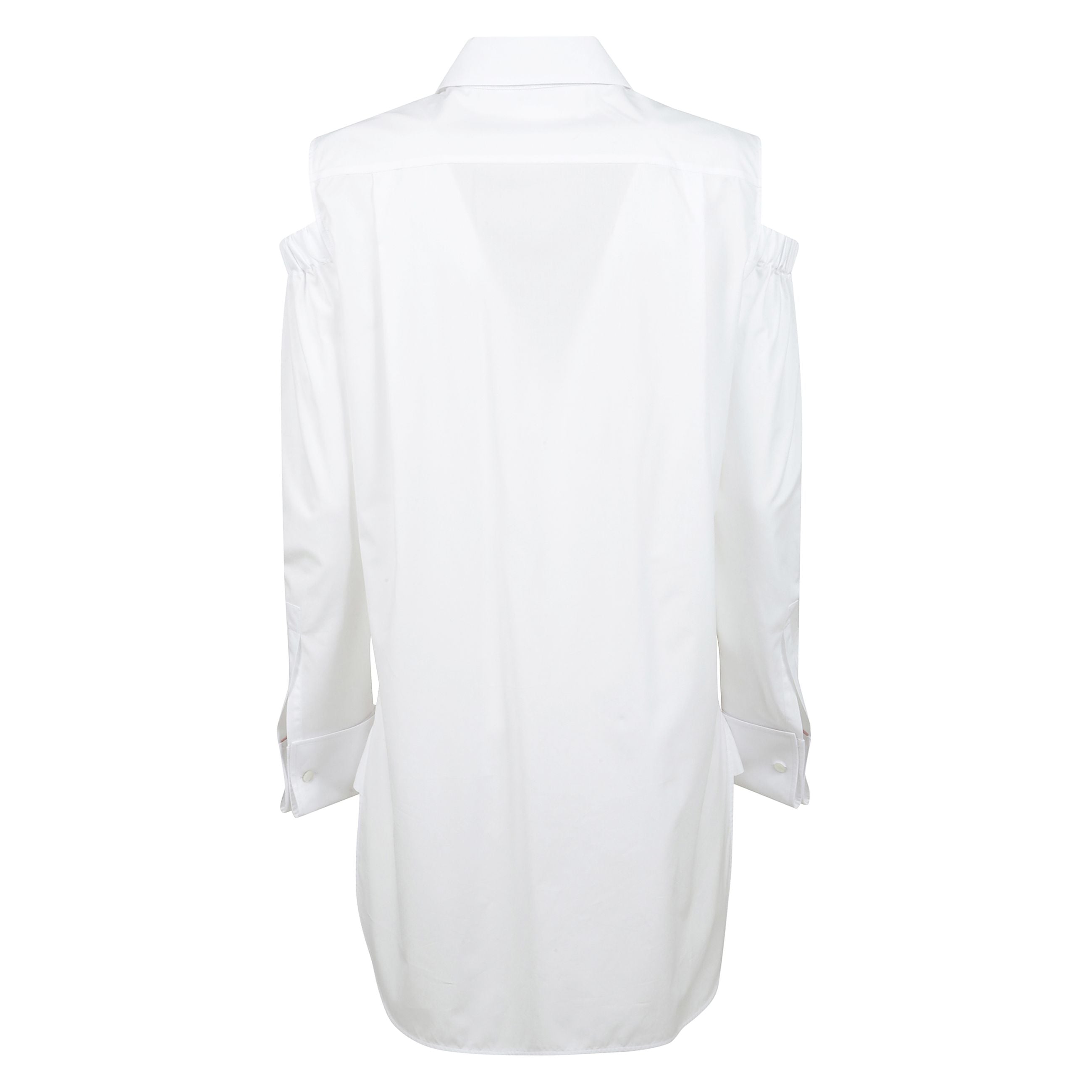 Camicia 'ragni' in popeline di cotone stretch, modello maschile lungo dalla linea dritta, maniche lunghe con dettaglio cut-out elastico arricciato su spalla, polsini alti con bottone gemello, fondo capo asimmetrico, spacchi laterali, chiusura bottoni.