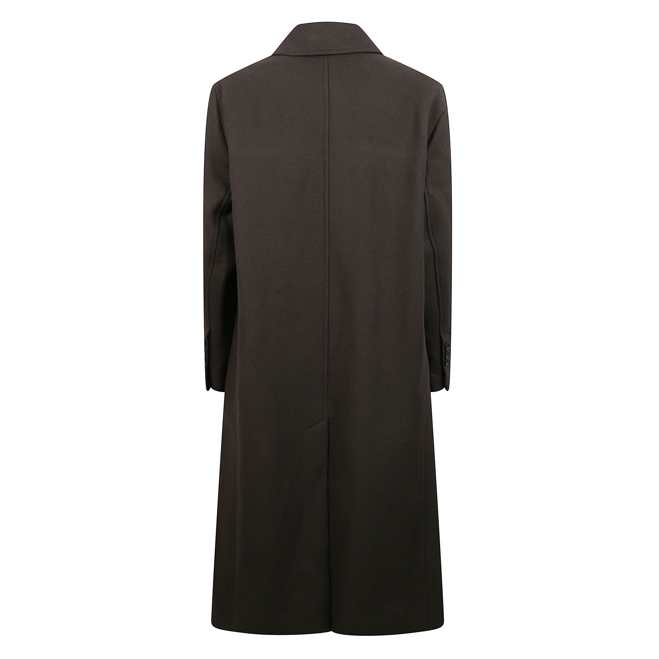 Cappotto doppiopetto in lana con bottoni. lunghezza maxi. revers classico.