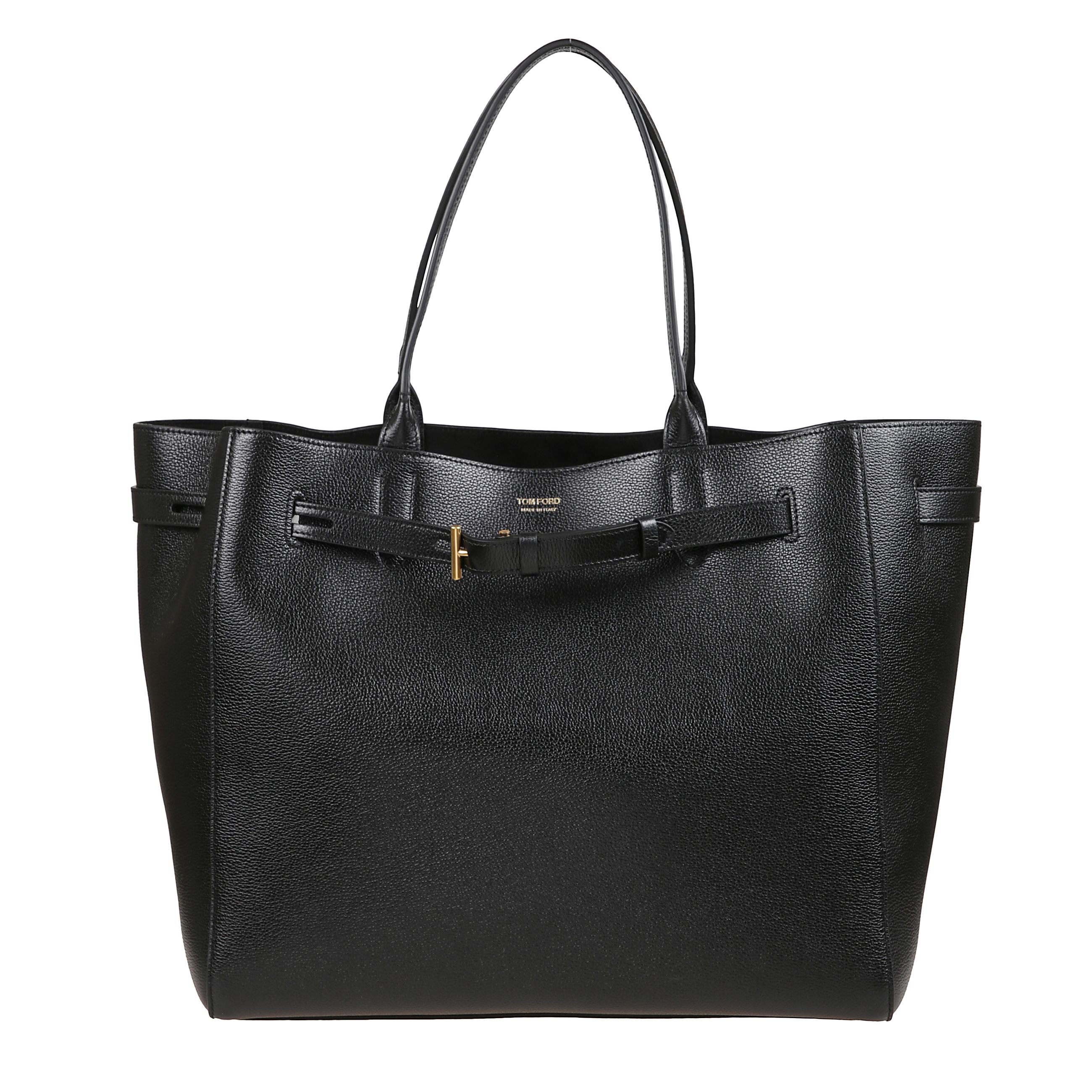 Borsa tote audrey large in pelle martellata nera con dettaglio metallico a t e cintura in pelle regolabile per modulare la forma. interno con ampio scomparto e tasca con zip, fodera in microfibra morbida.