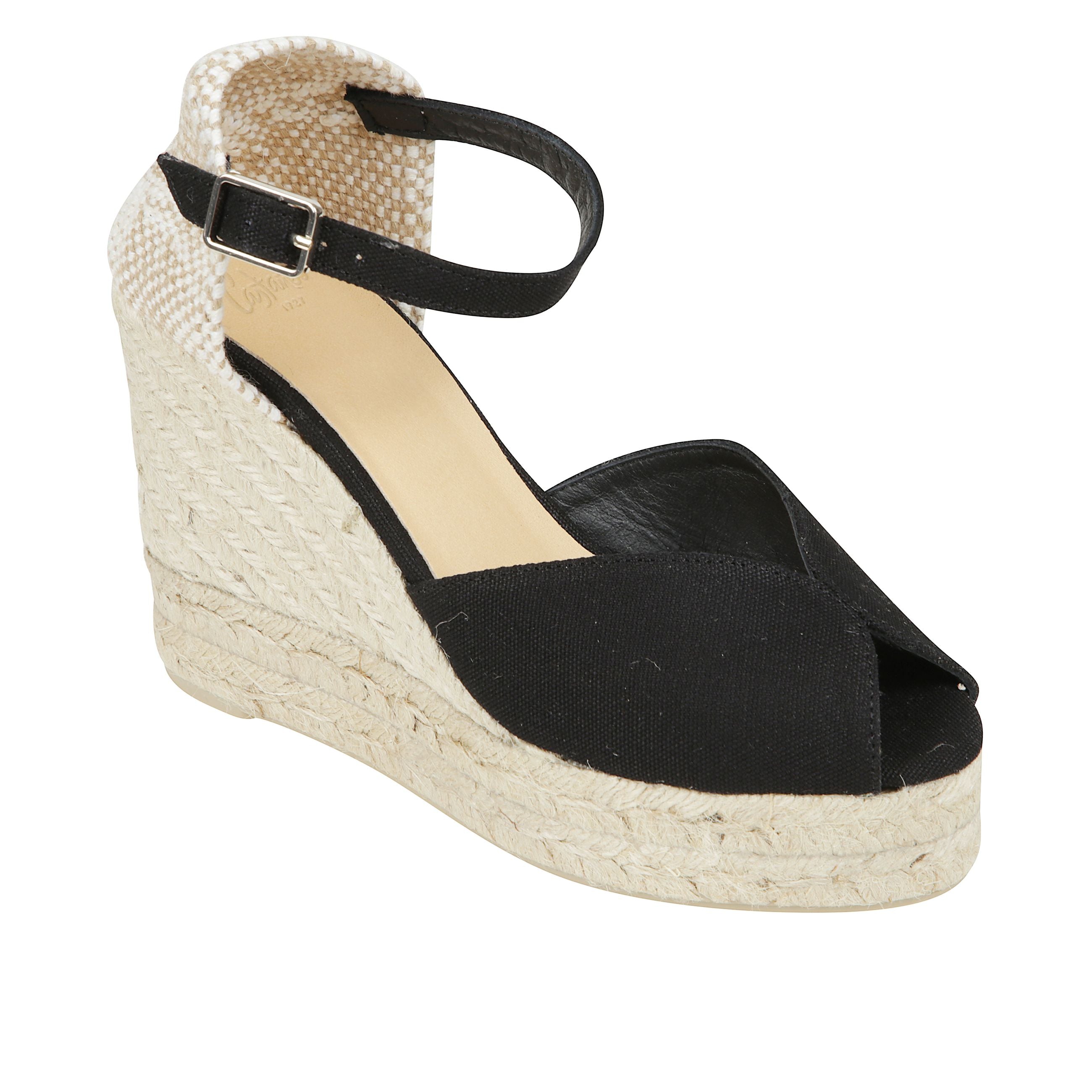 Sandalo bianca stile peep-toe in cotone organico con chiusura a cinturino, soletta imbottita e zeppa in juta con doppio plateau.