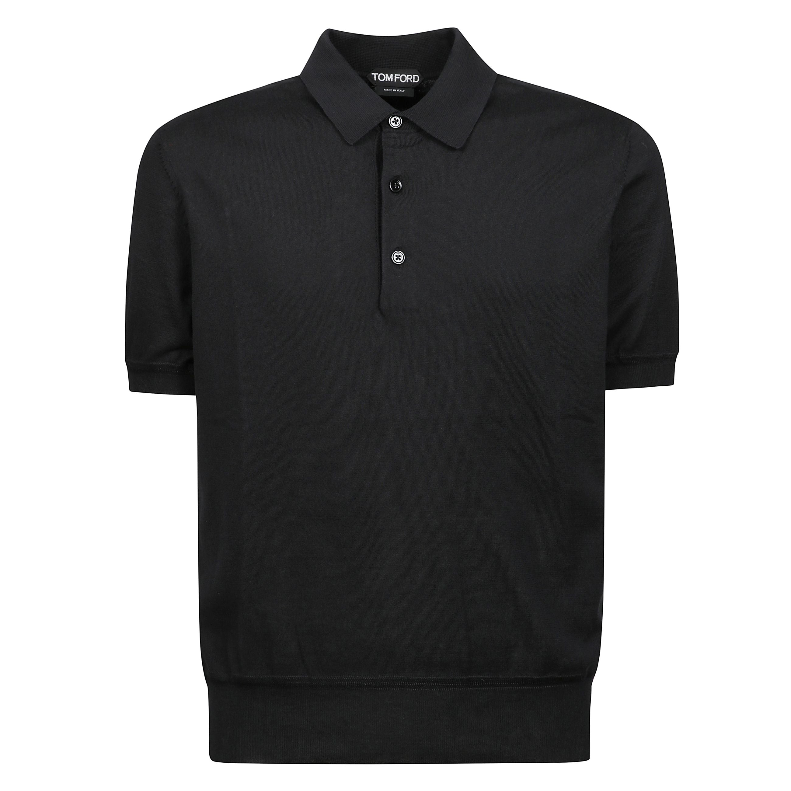 Polo a maniche corte in cotone, con mezza abbottonatura.