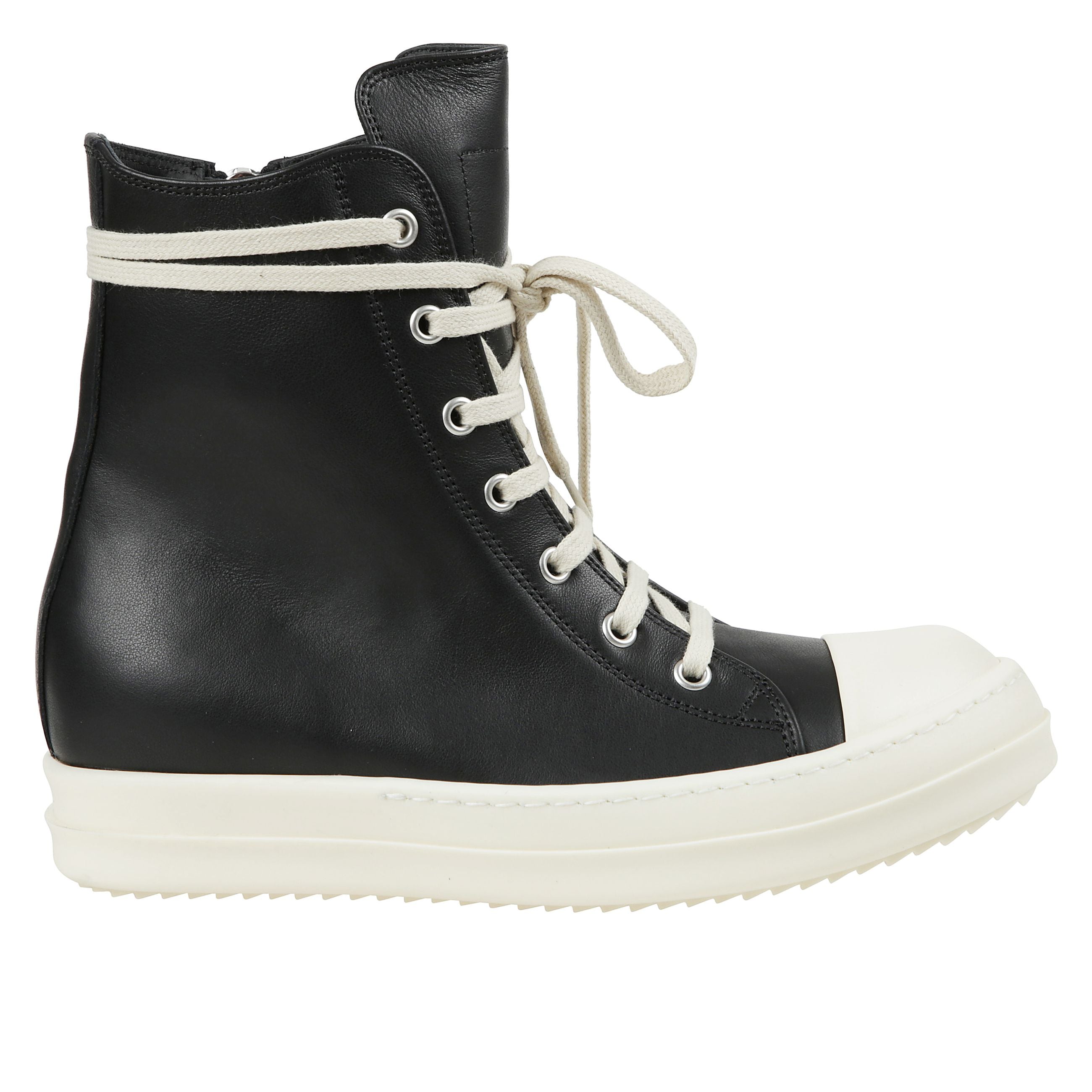 Sneakers high-top in pelle. punta tonda in gomma rinforzata. chiusura con zip laterale metallica e allacciatura frontale con linguetta alta. suola a cassetta in gomma con dente di squalo.