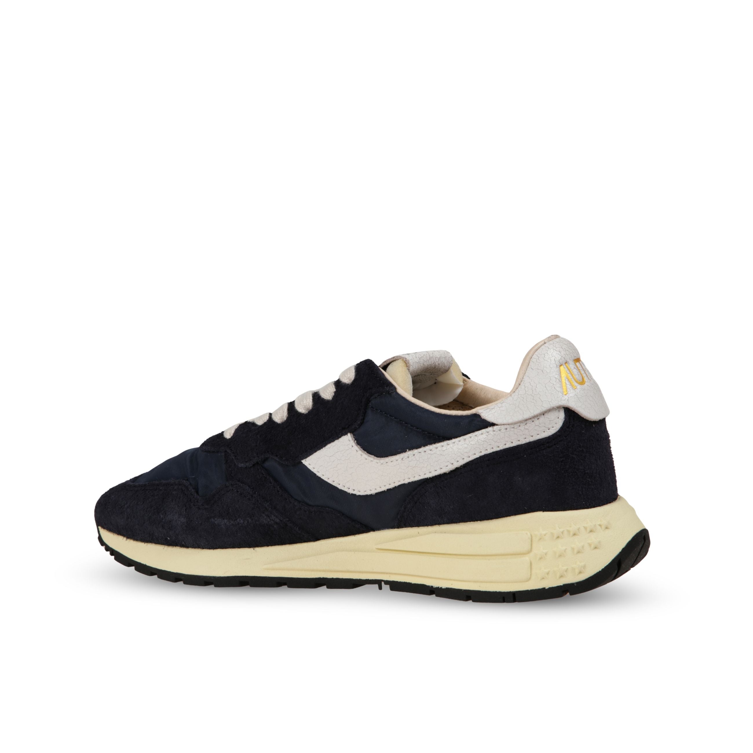Sneakers autry reelwind. struttura in pelle e nylon con inserti in suede. talloncino ed inserti laterali in pelle con lieve effetto vintage.