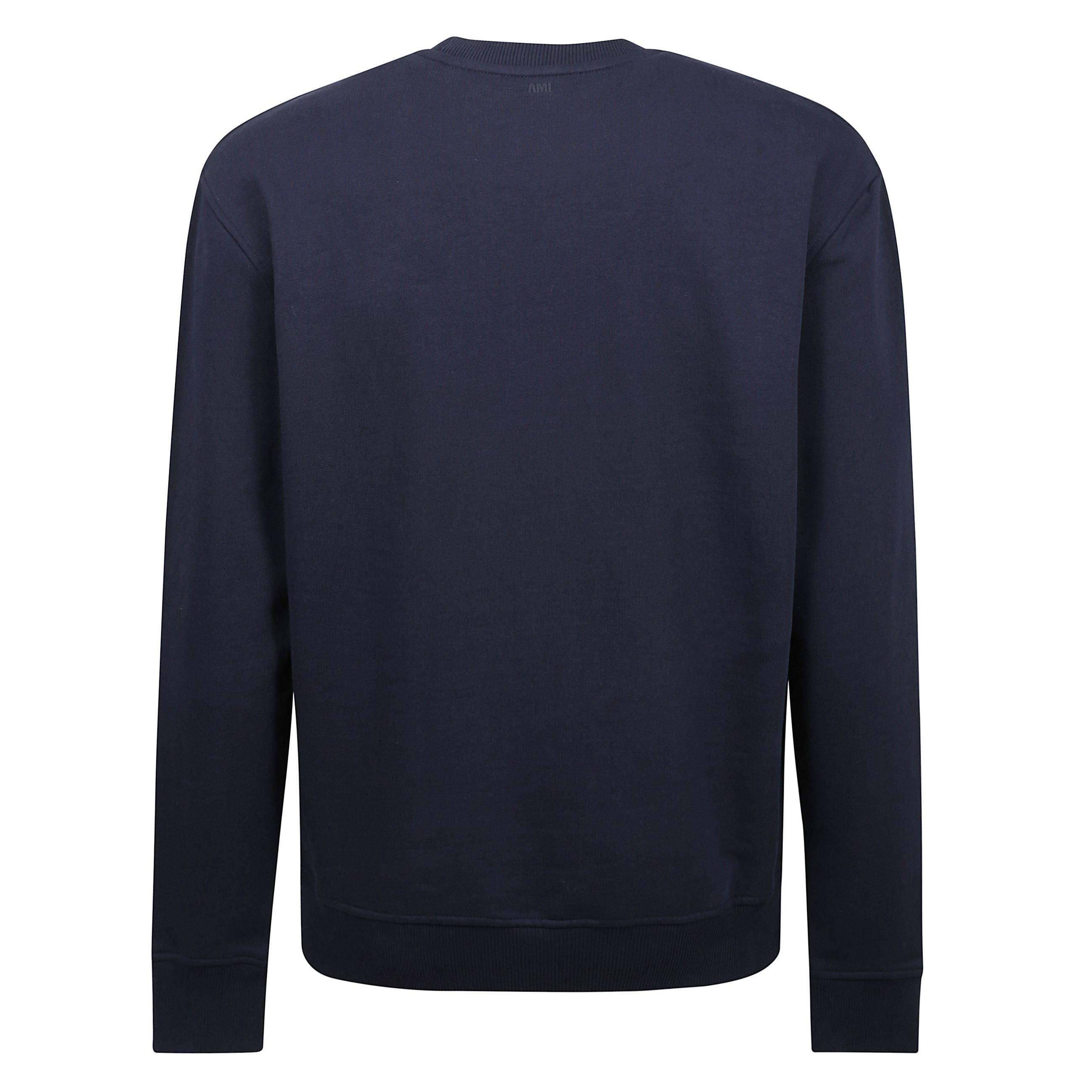 Felpa in cotone nero, caratteristico motivo con monogramma ami de coeur, logo sul retro, orlo e polsini a coste.