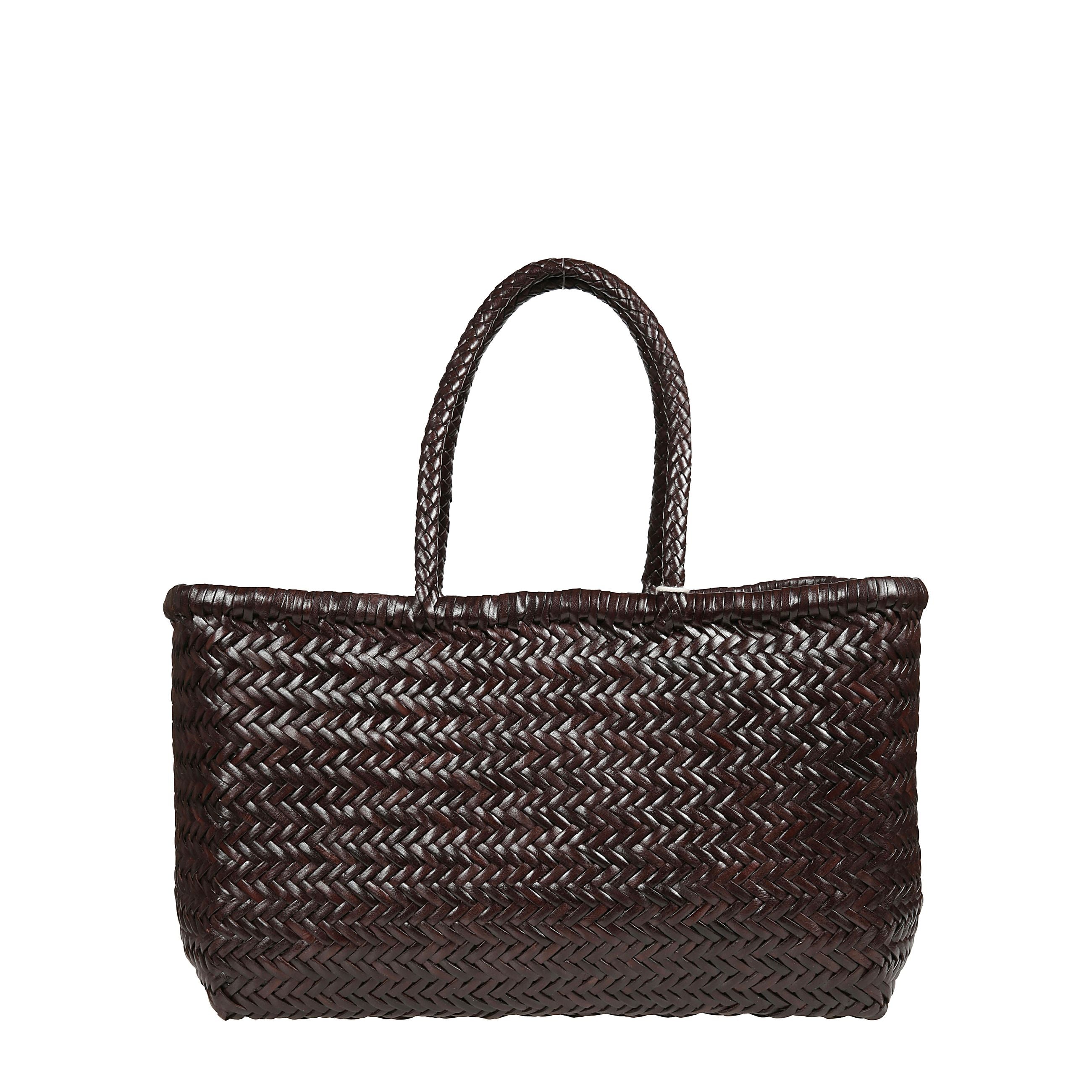 Bamboo triple jump di dragon diffusion. corpo in pelle intrecciata a mano con motivo a spina di pesce. manici superiori in pelle intrecciata.