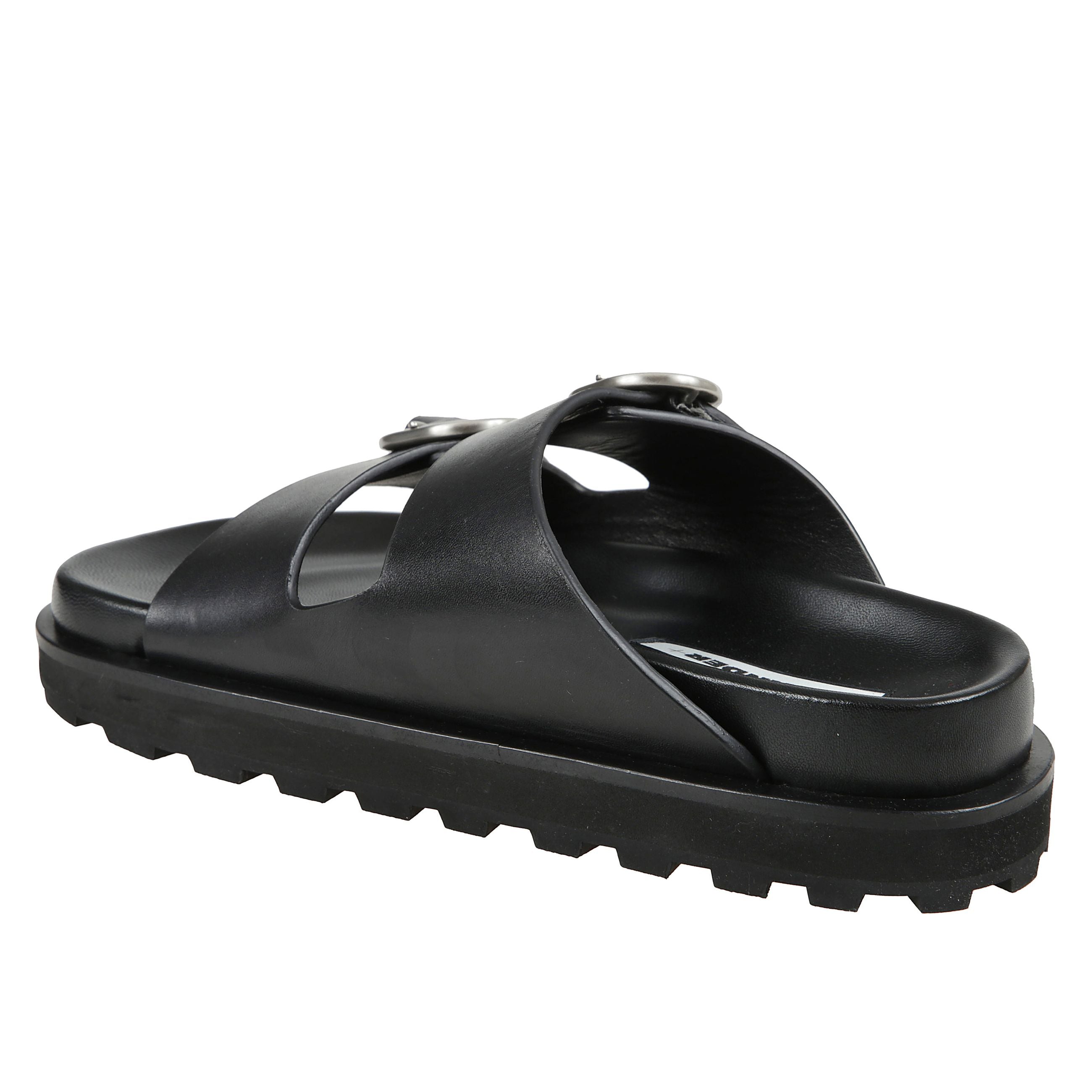 Sandali bassi con fibbie e suola rialzata