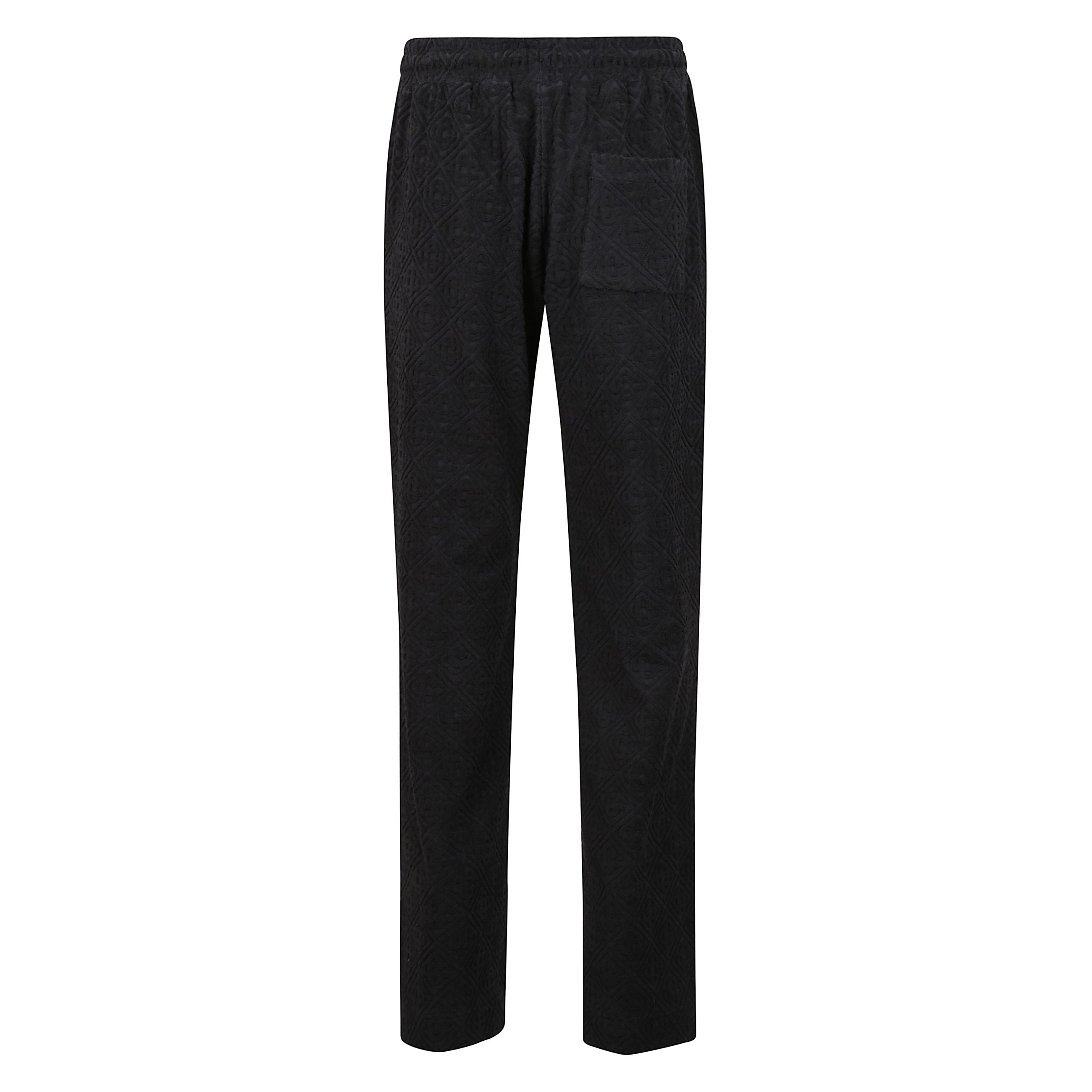 Pantaloni casablanca in cotone. tasche laterali a filetto. tasca posteriore applicata.