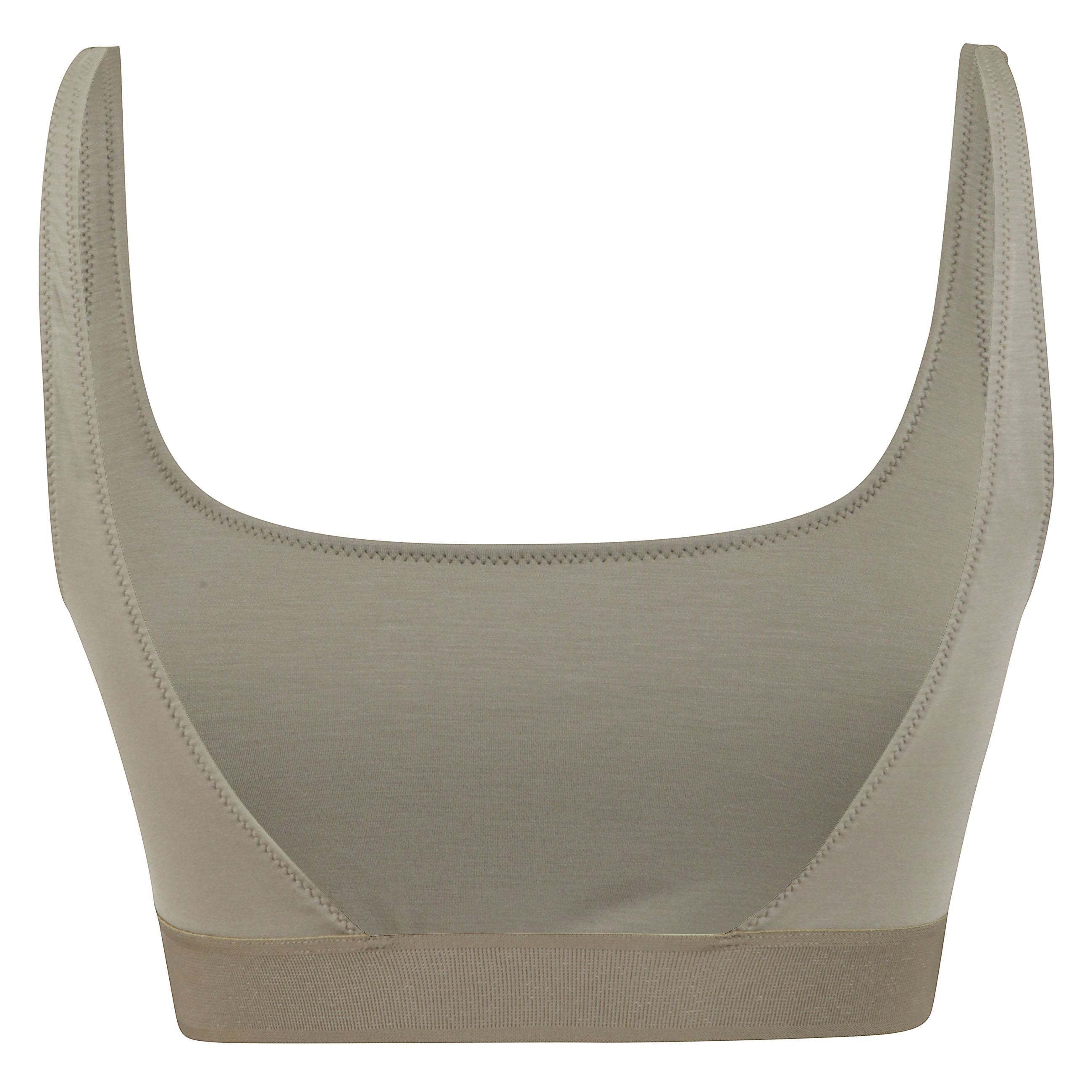 Top corto e aderente con scollo rotondo sul davanti e scollo ad u sul retro. spalline sottili e fascia elasticizzata sul fondo. firma tom ford in jacquard sul davanti.