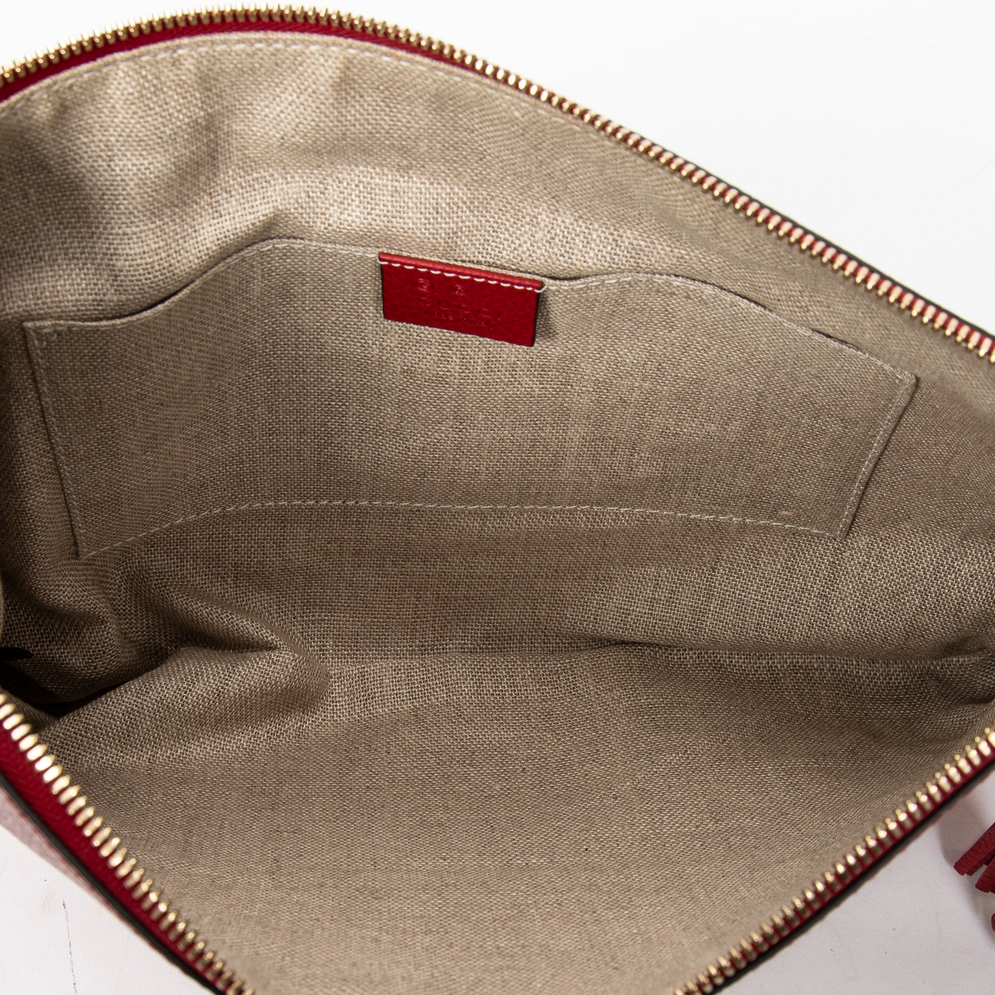 Bamboo Tassel Zip Clutch 