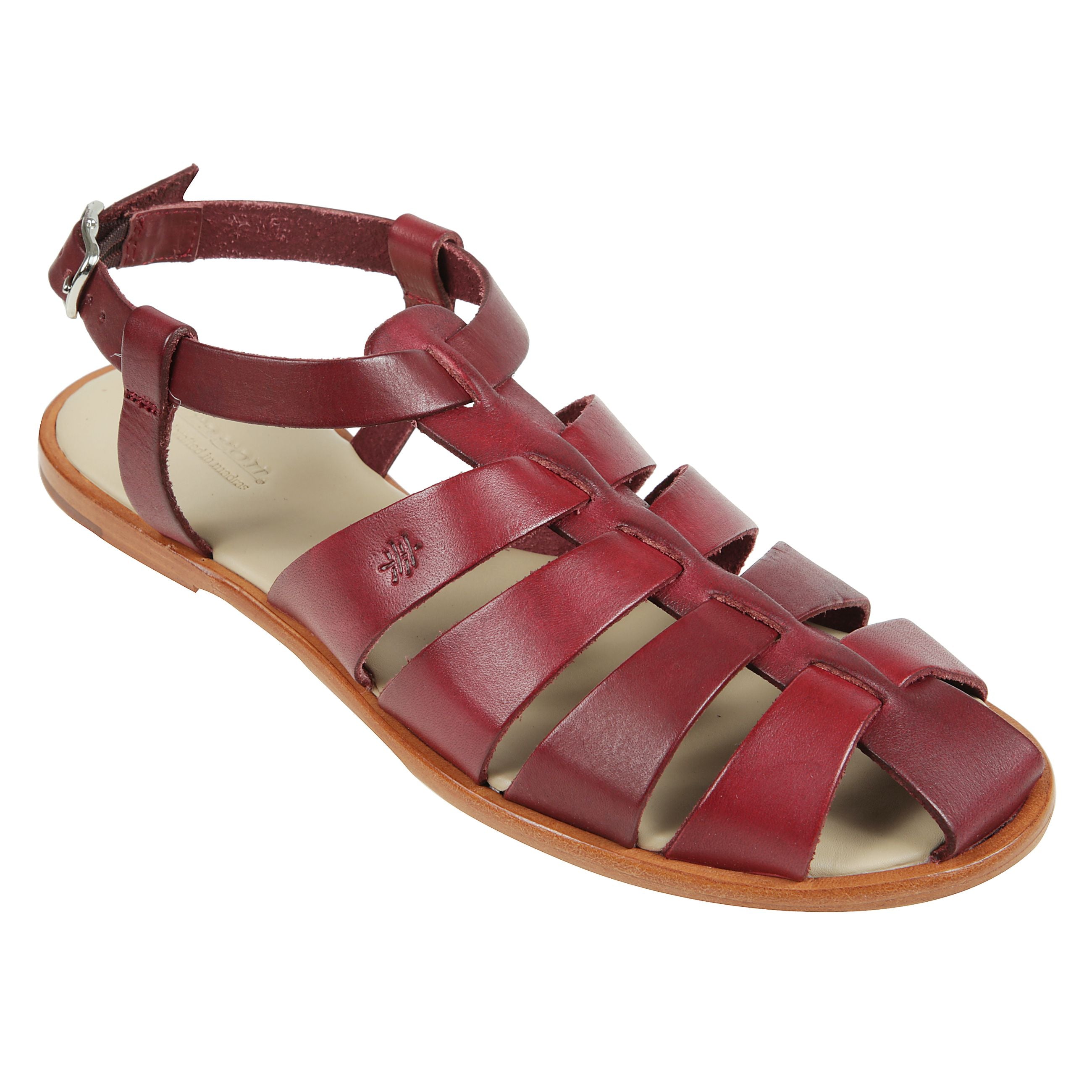 Sandali a tacco piatto da pescatore con copertura moderata intrecciata e fibbie metallica regolabili. questo articolo garantisce una produzione artigianale sviluppata in un contesto non industriale, in piccole serie. l'artigianato preserva le abilitÃ  spe