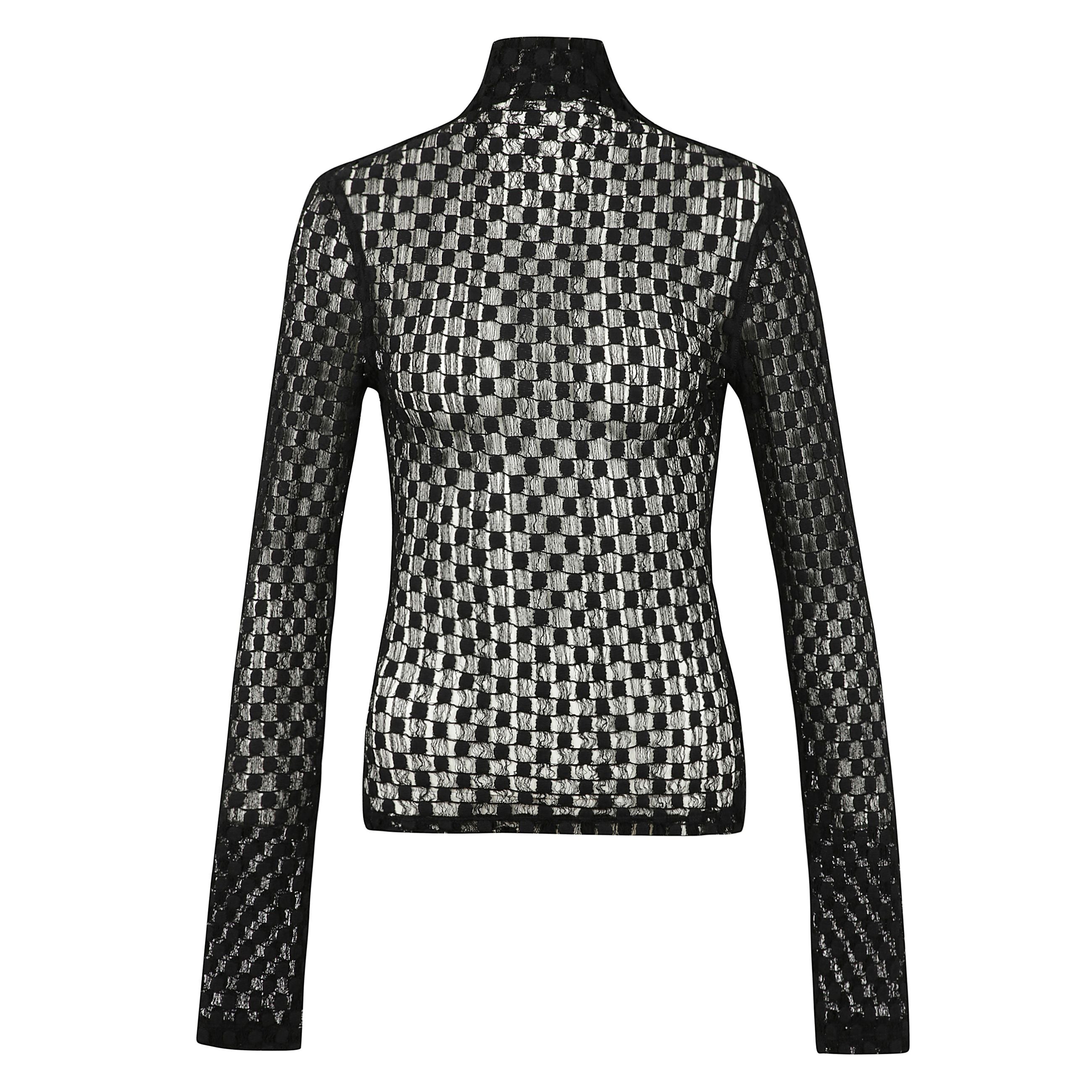 Top dolcevita in pizzo geometrico rifinito con una chiusura centrale posteriore con cerniera cieca