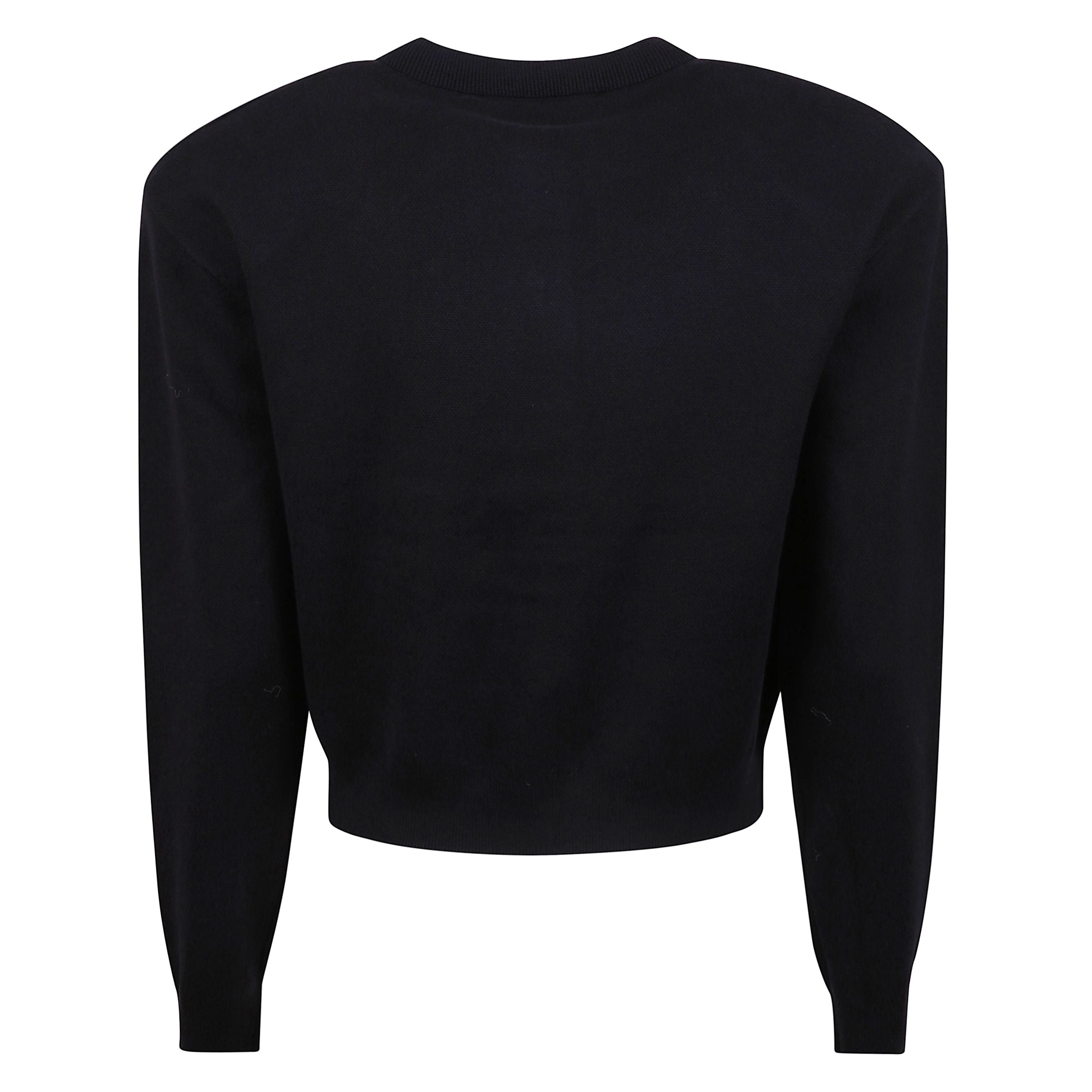 Cardigan nero in morbido cotone biologico. scollo rotondo e chiusura frontale con bottoni metallici che formano la scritta ârotateâ. maniche lunghe con polsini a coste e orlo leggermente cropped. spalle strutturate con imbottiture removibili.