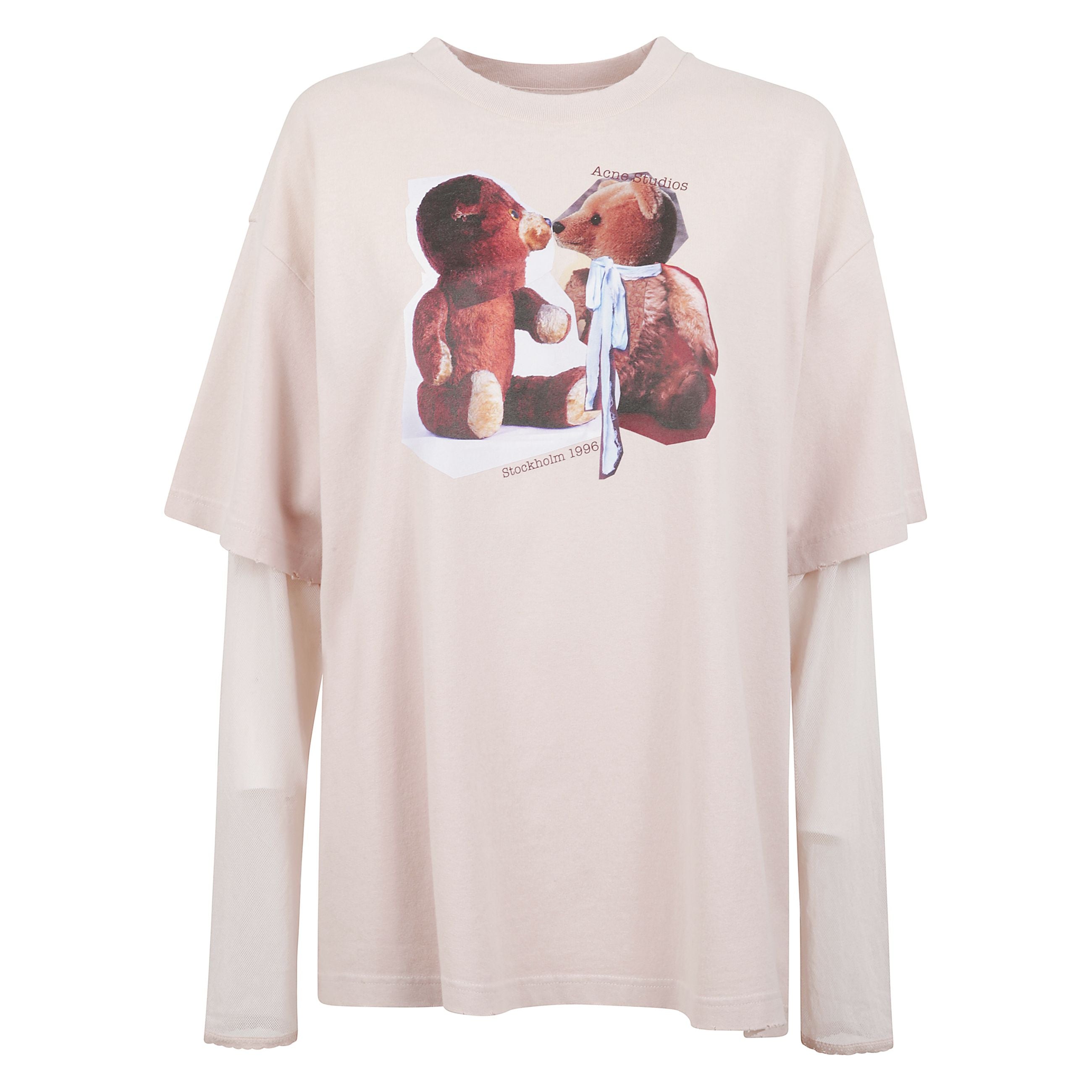 T-shirt in jersey di cotone con finitura vintage che dona un aspetto naturalmente vissuto. il design si distingue per il doppio strato: una maglia a maniche corte sovrapposta a un sottile top in rete con maniche lunghe e delicati dettagli in pizzo, che ag