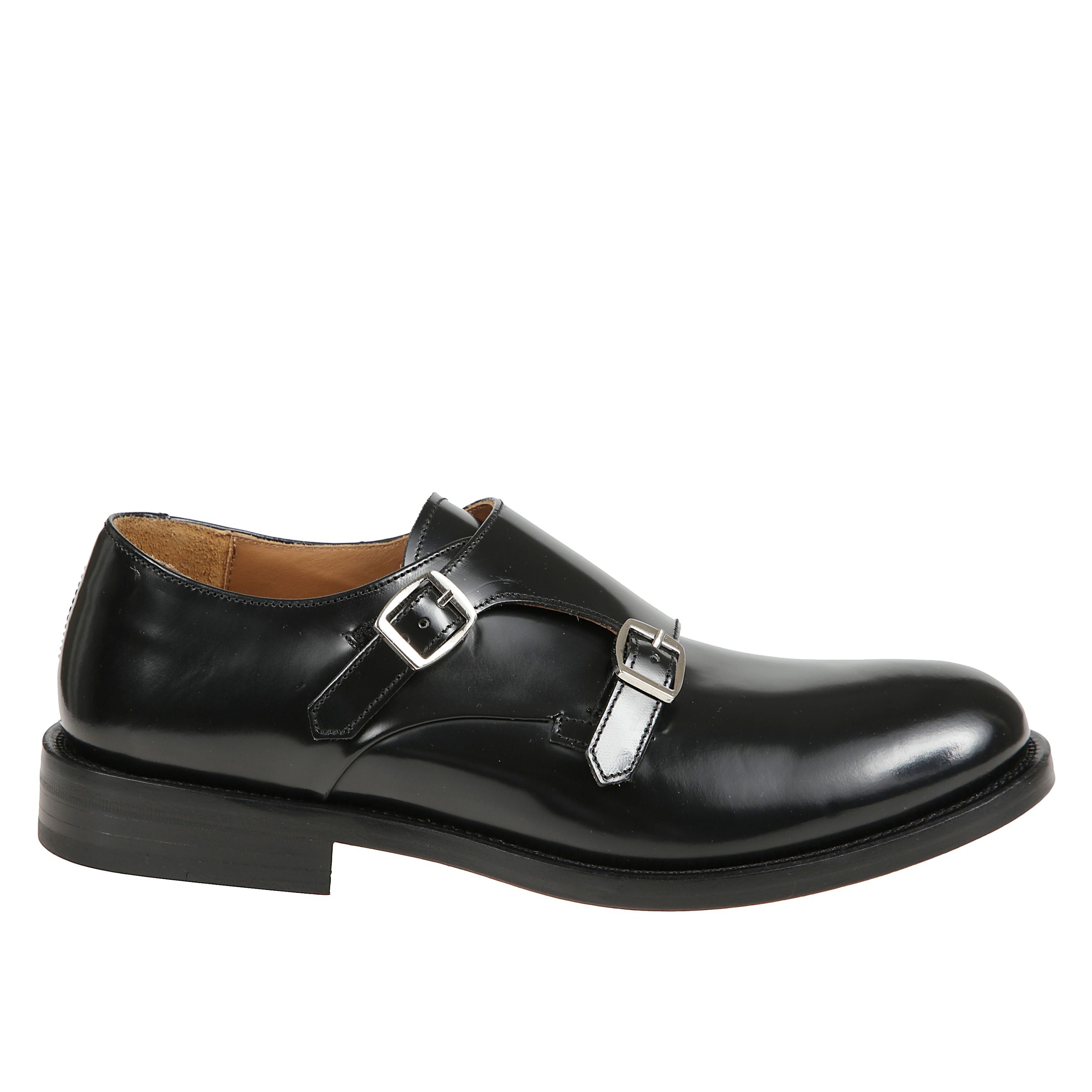 Scarpe in pelle con doppia fibbia.