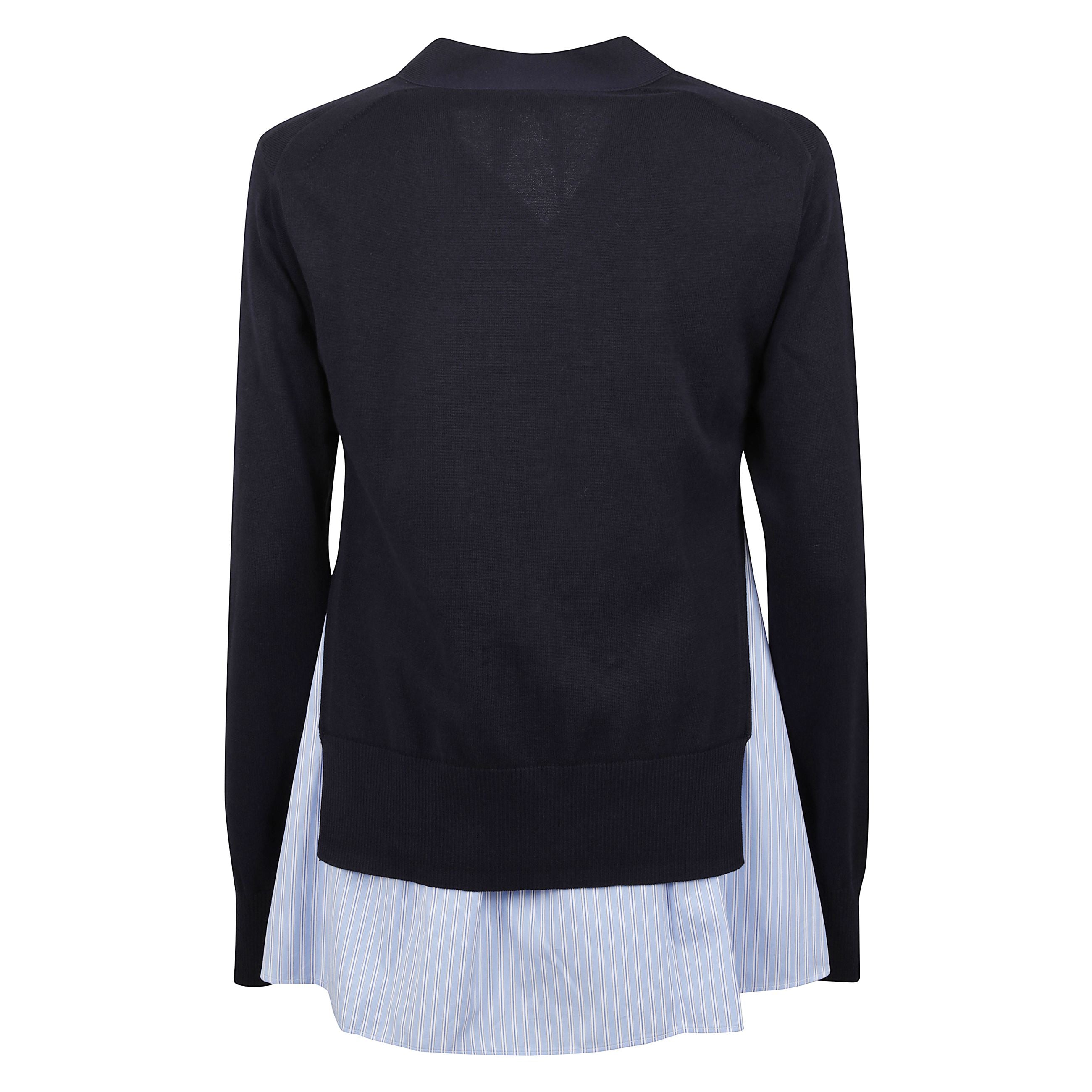 Cardigan in maglia di lana. scollo a v. chiusura frontale con bottoni. tasche applicate sul davanti. orlo a costine. sul fondo, inserto di tessuto con motivo a righe.