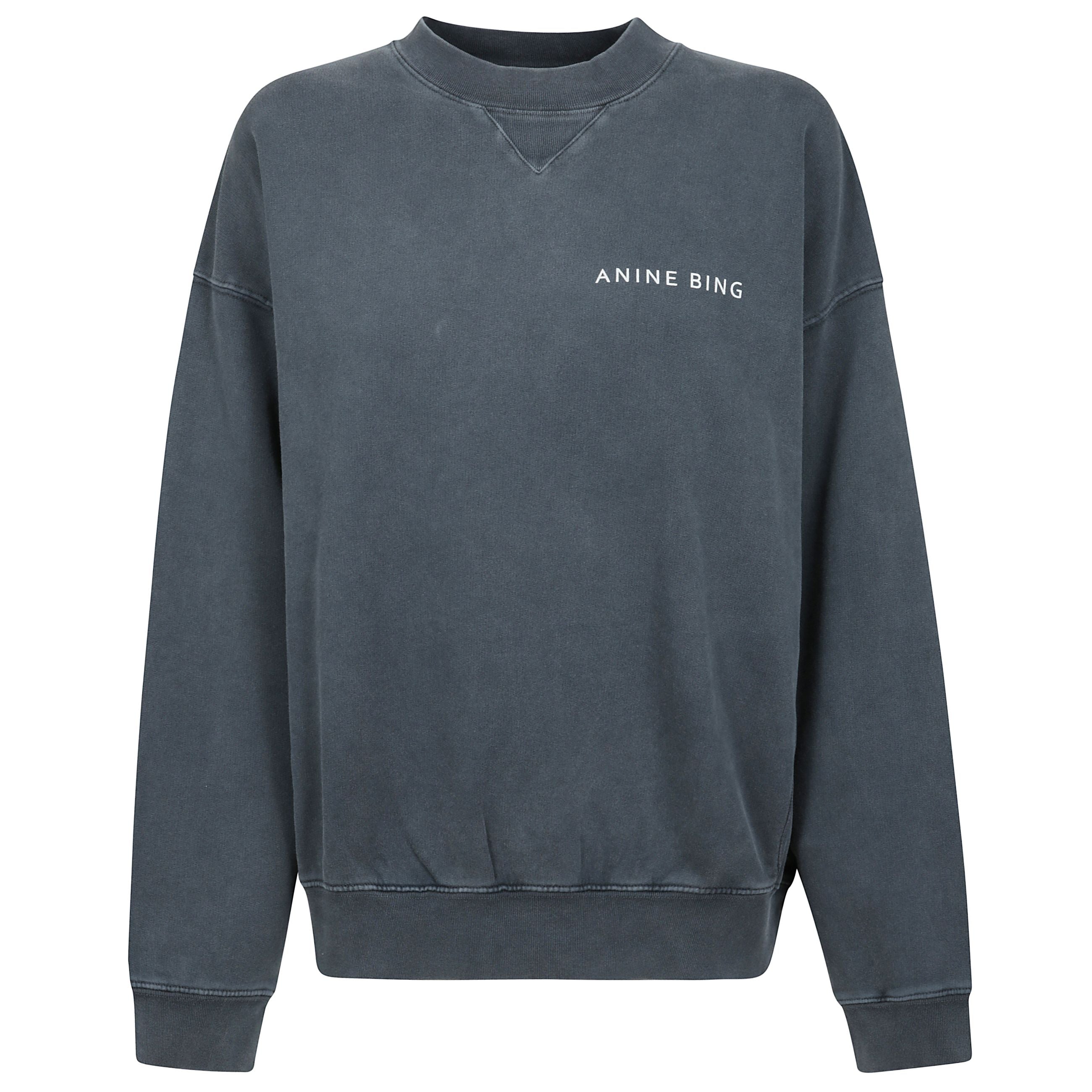 La felpa jaci di anine bing Ã¨ realizzata in 100% cotone, con un effetto vintage vissuto che gli conferisce uno stile unico. presenta spalle basse per un look rilassato, bordi a costine per un maggiore comfort e un logo a contrasto sul petto. la grande st