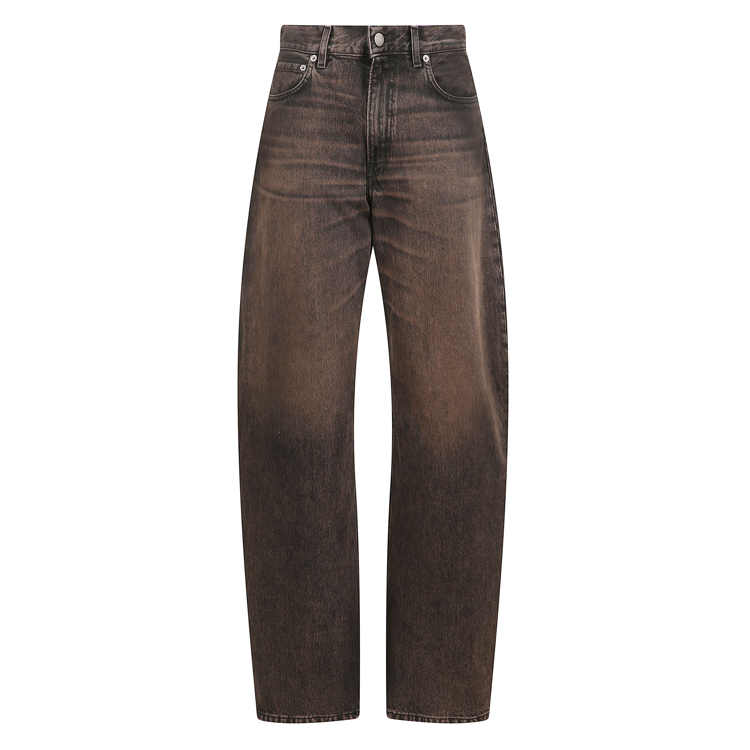 Jeans in denim. vita media con taglio a gamba ampia che si stringe alla caviglia. modello a cinque tasche. chiusura con cerniera e bottone.