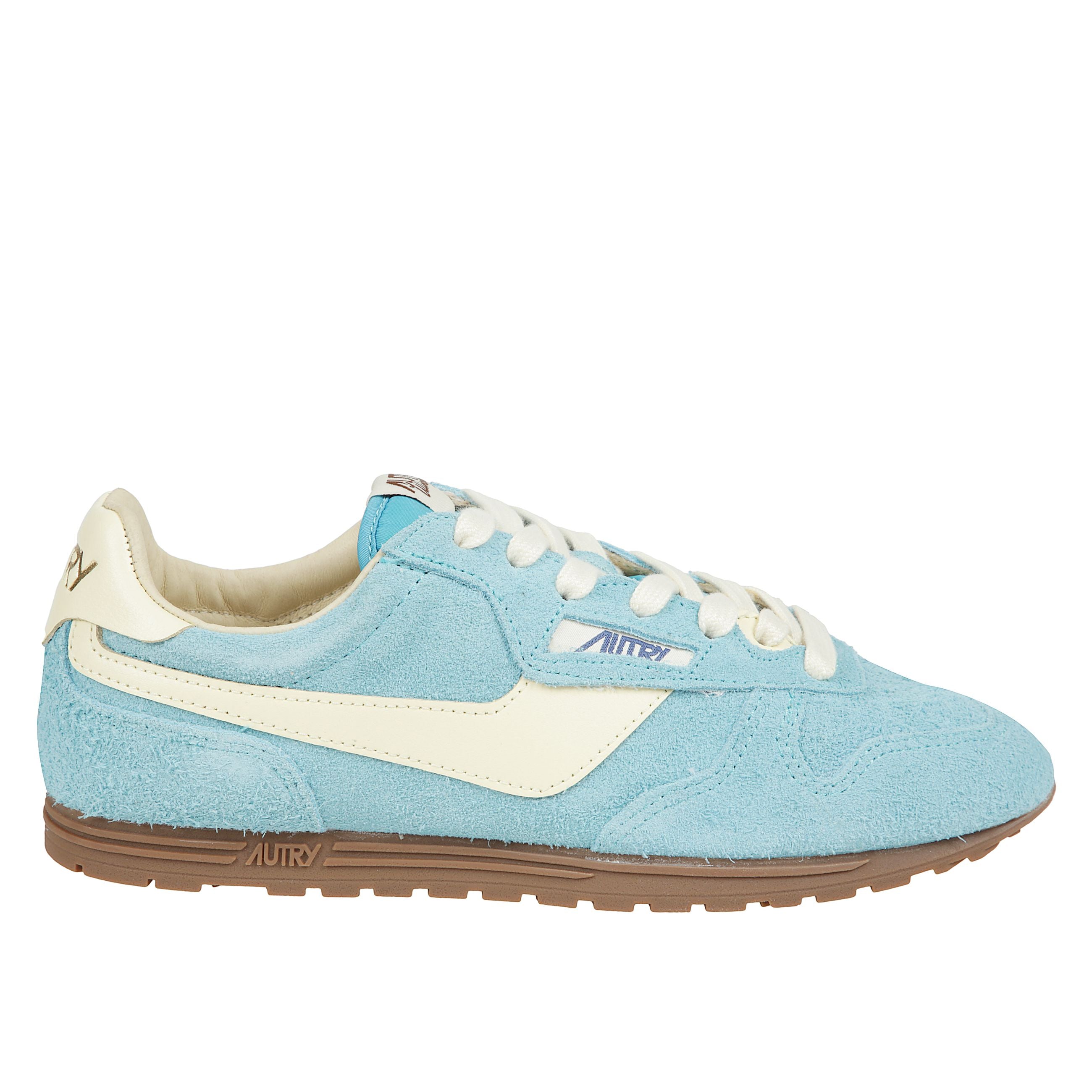 Sneakers  in pelle liscia e scamosciata spazzolata, lacci piatti in cotone, linguetta imbottita in nylon con etichetta con logo jacquard, colletto imbottito, fodera in pelle e spugna di cotone, soletta interna foderata in mesh