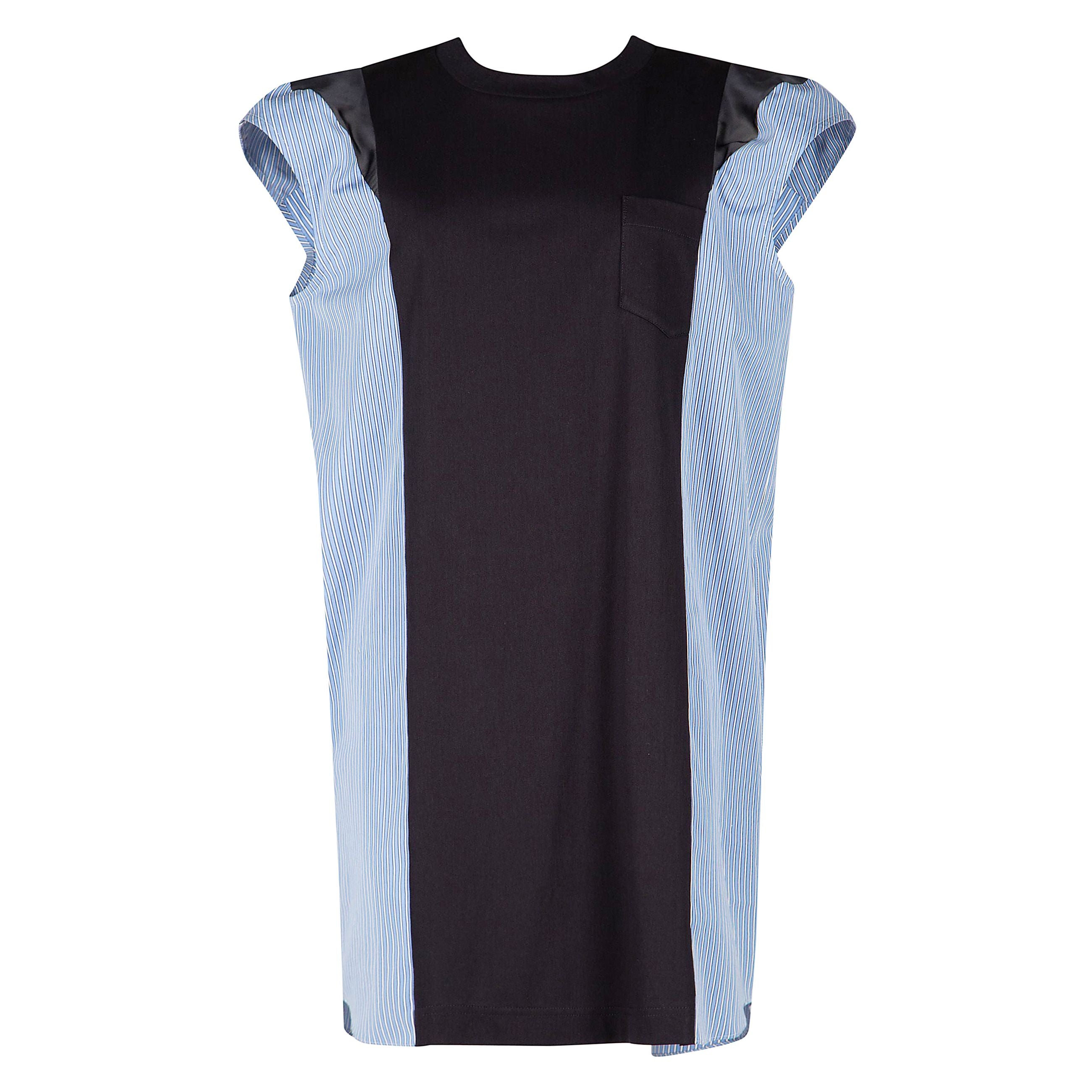 Capo realizzato in una combinazione di cotone e poliestere. presenta una costruzione a pannelli con strisce su tutta la superficie. e' dotato di un collo a girocollo in maglia ribattuta, tasca a toppa sul petto. interno parzialmente foderato in satin di c