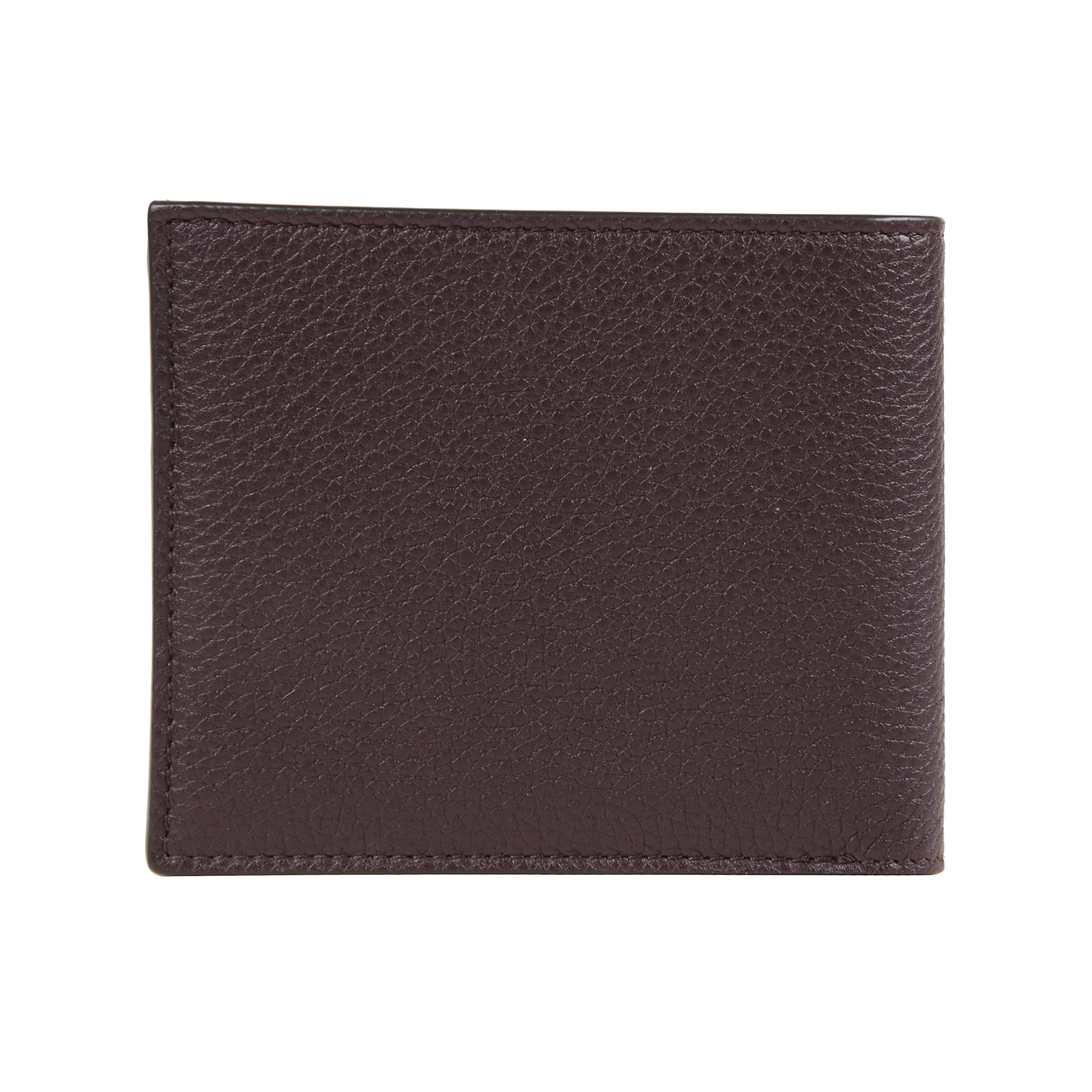 Portafogli in pelle. slot multipli per schede e vano centrale. dimensioni compatte. logo tom ford sulla parte frontale.