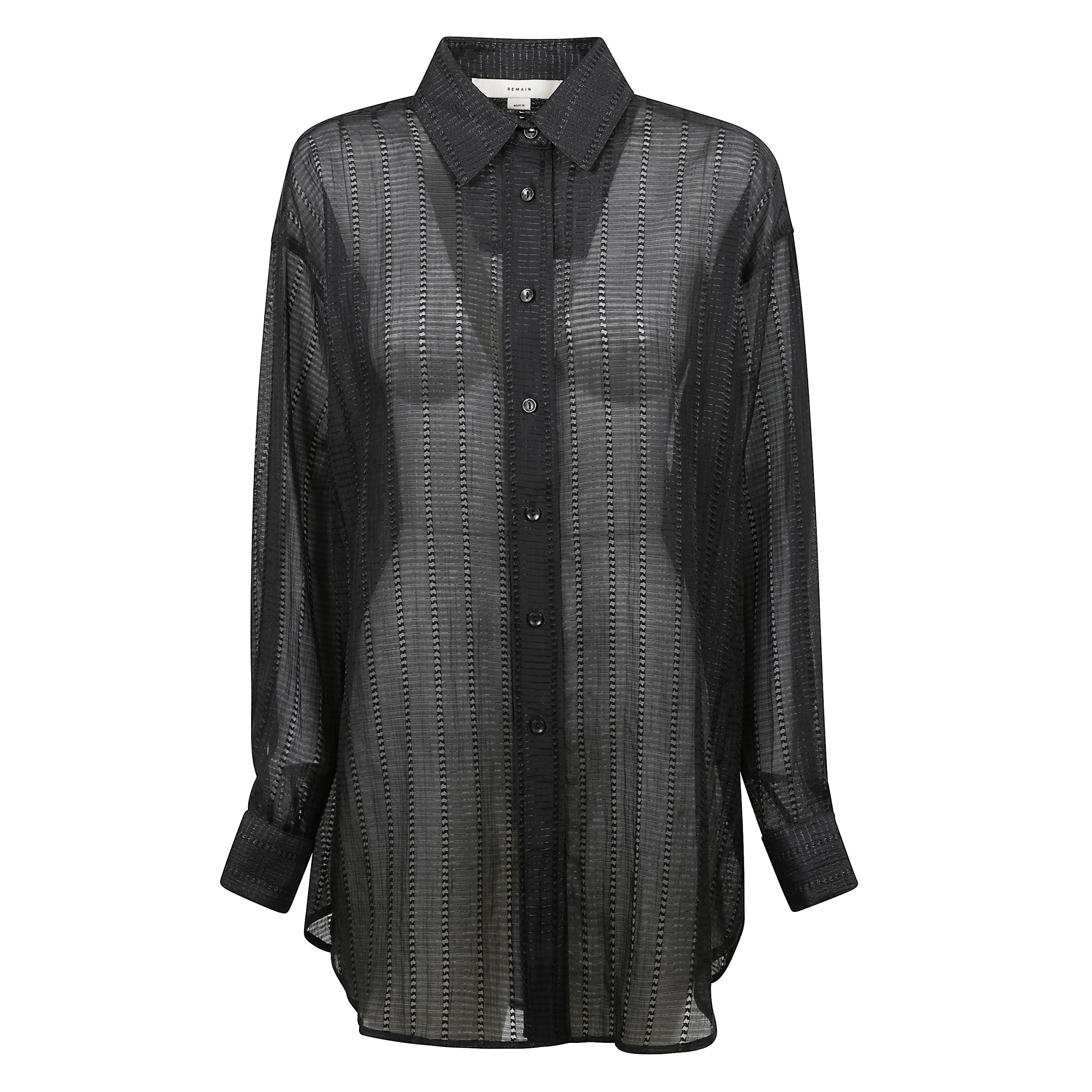 Camicia traforata semi-trasprente, chiusura frontale con abbottonatura e polsini con abbottonatura