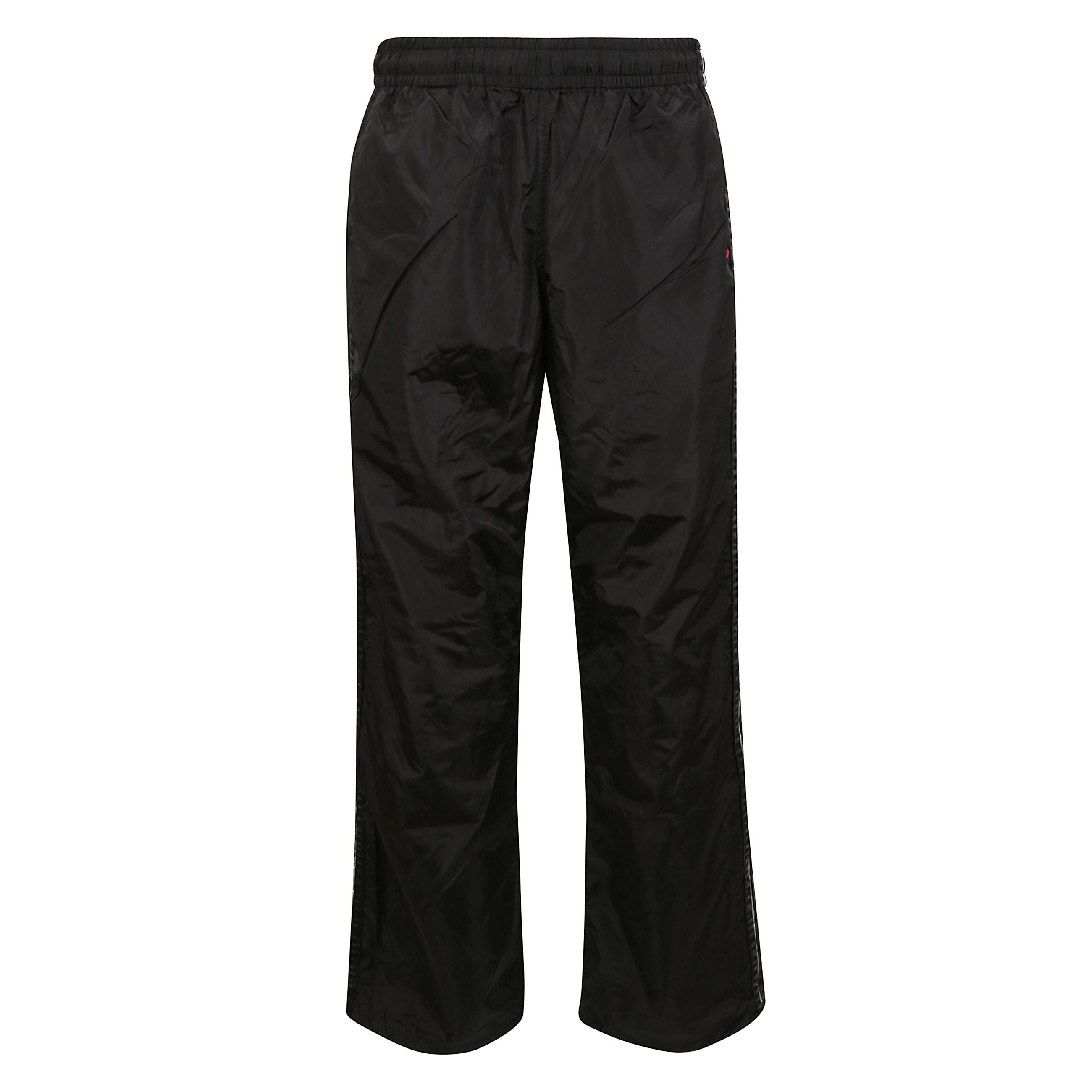 Pantaloni sportivi p-caron, vita elasticizzata
e due tasche posteriori con zip