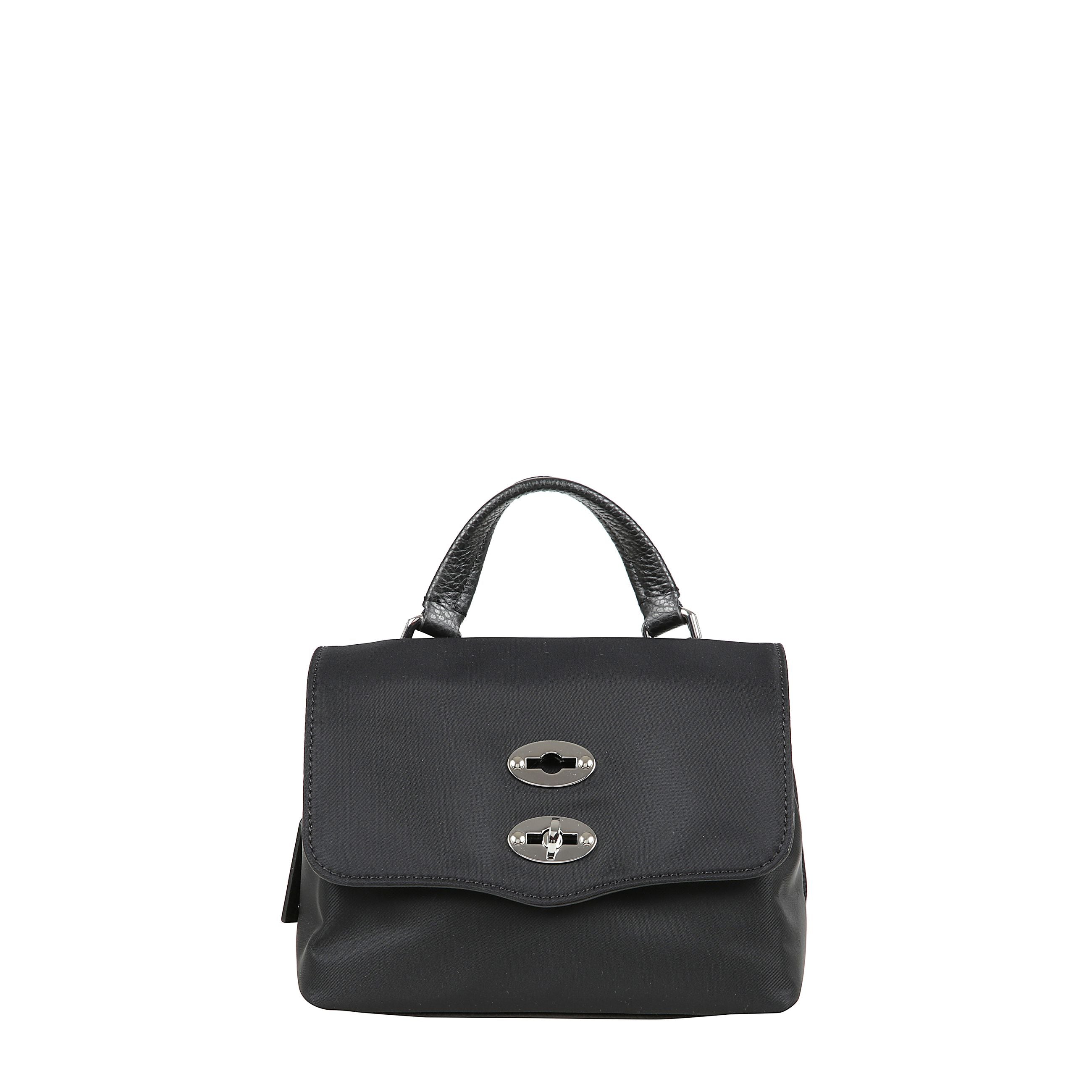 Borsa a mano che presenta dettagli in argento, un manico superiore e una tracolla rimovibile in pelle, una chiusura turn-lock e una pratica tasca interna.