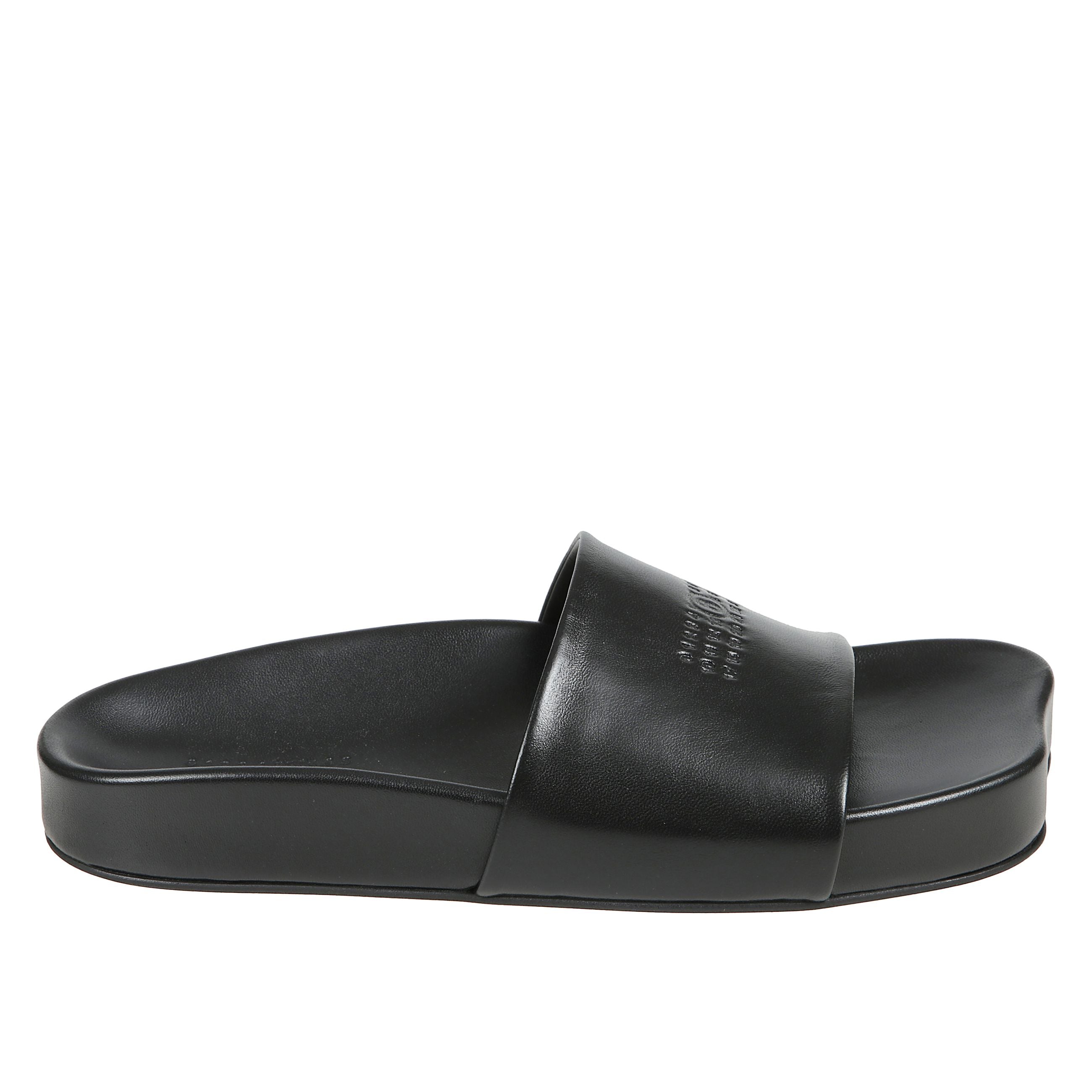 Sandali anatomici piatti caratterizzati da una tomaia e una fodera in pelle logo numerico della maison sulla parte superiore