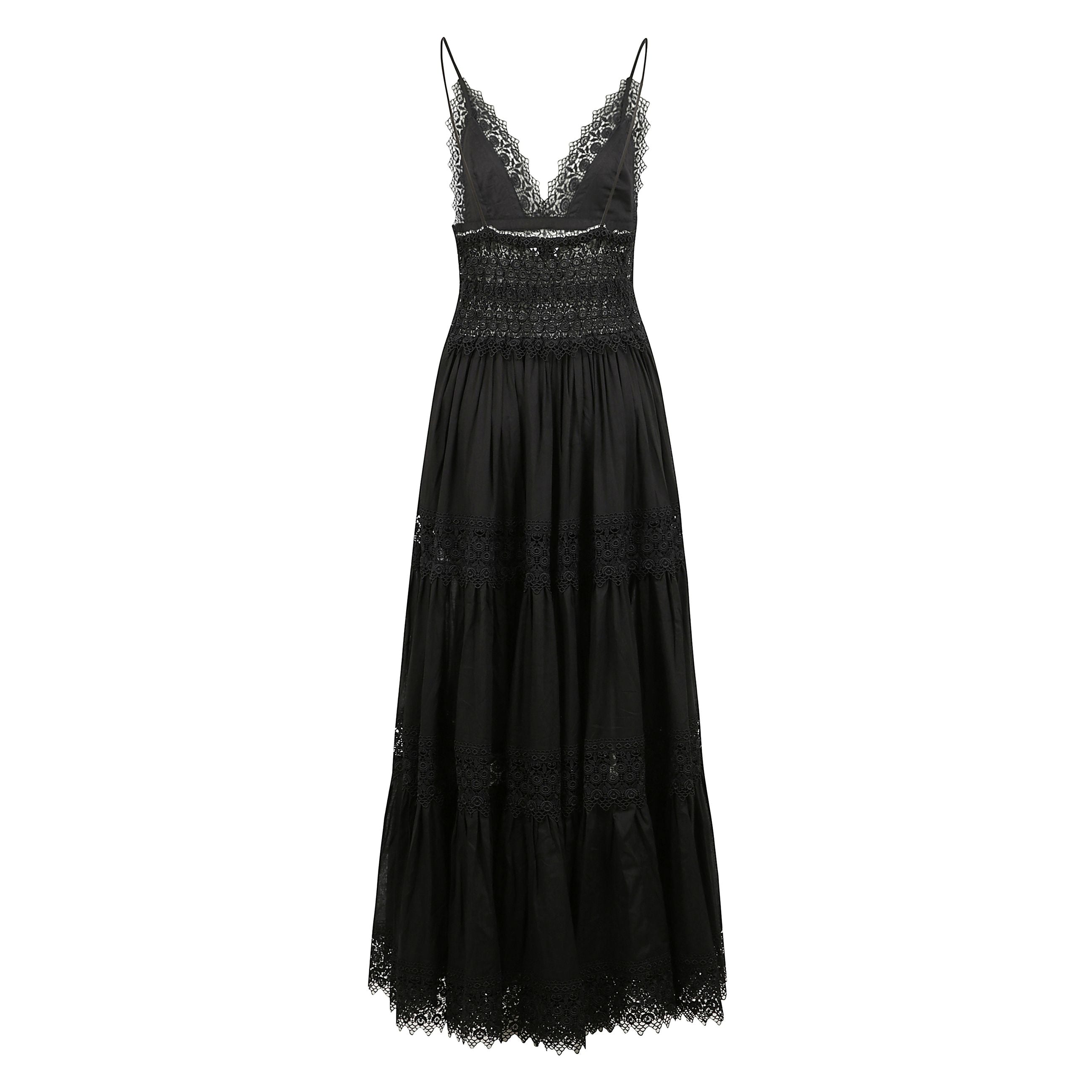 Il lungo abito cindy con le sezioni triangolari di cotone che coprono il petto esaltano la scollatura a v, creando l'effetto di una spettacolare scollatura sagomata. sono tenuti da due belle cinghie molto sottili. una fascia traforata di sarte guipure in 