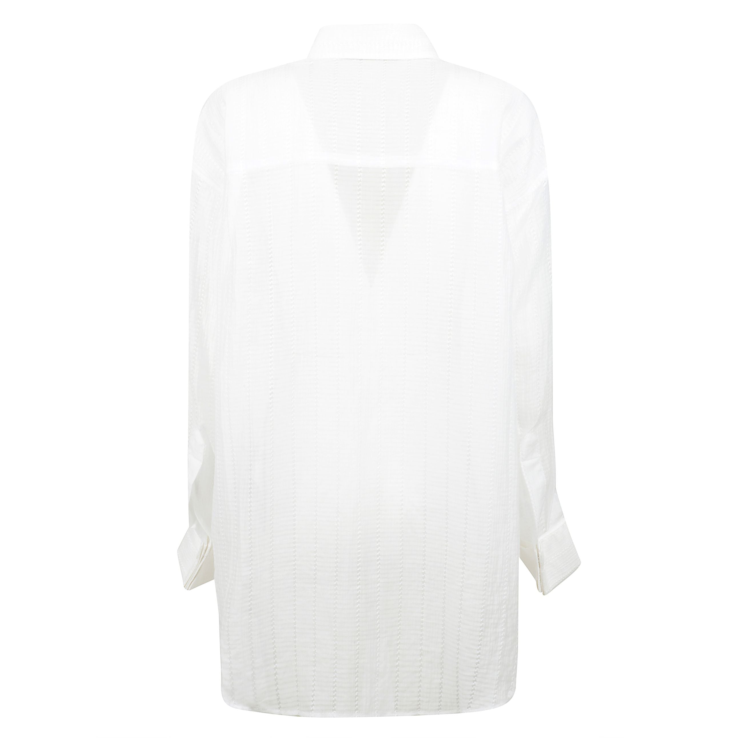 Camicia oversize dal design traforato, chiusura frontale con abbottonatura e polsini con bottoni