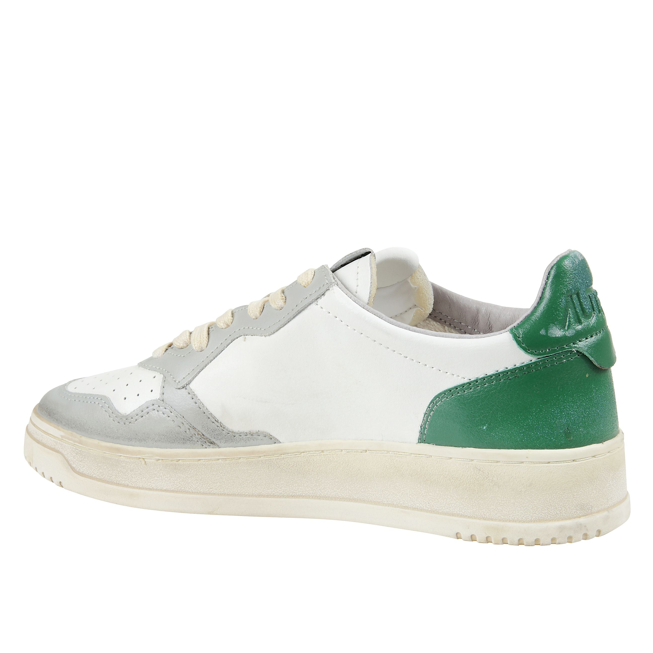 Sneaker stringata super vintage in pelle con suola in gomma