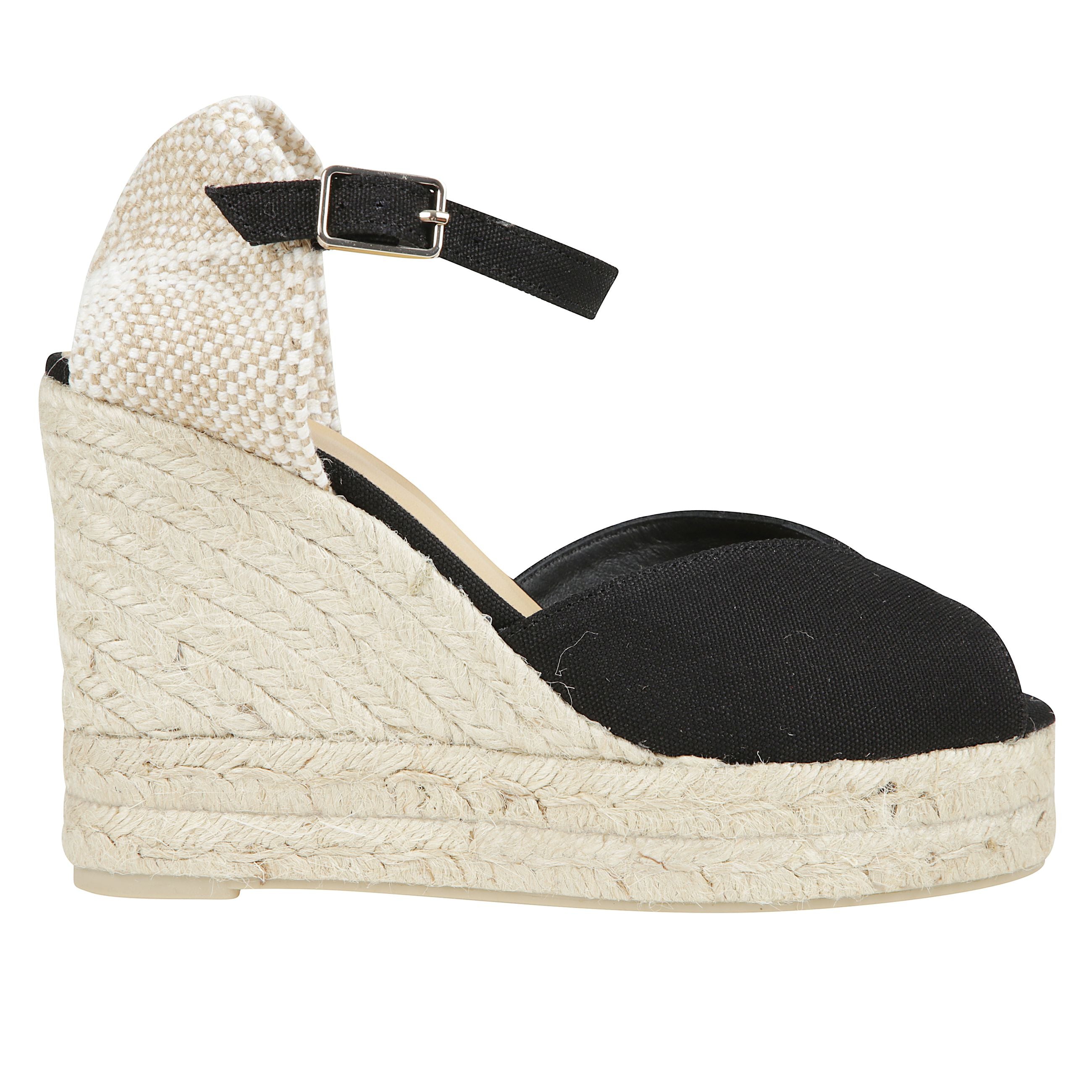 Sandalo bianca stile peep-toe in cotone organico con chiusura a cinturino, soletta imbottita e zeppa in juta con doppio plateau.