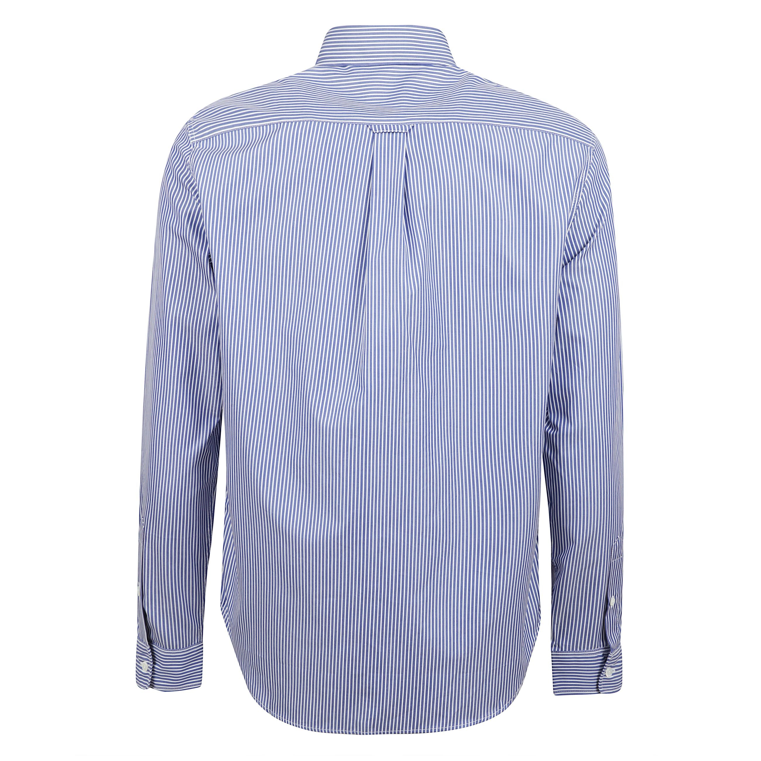 Camicia in popeline a righe, maniche lunghe rifinite con bottoni dritti e logo fox head ricamato sul petto.