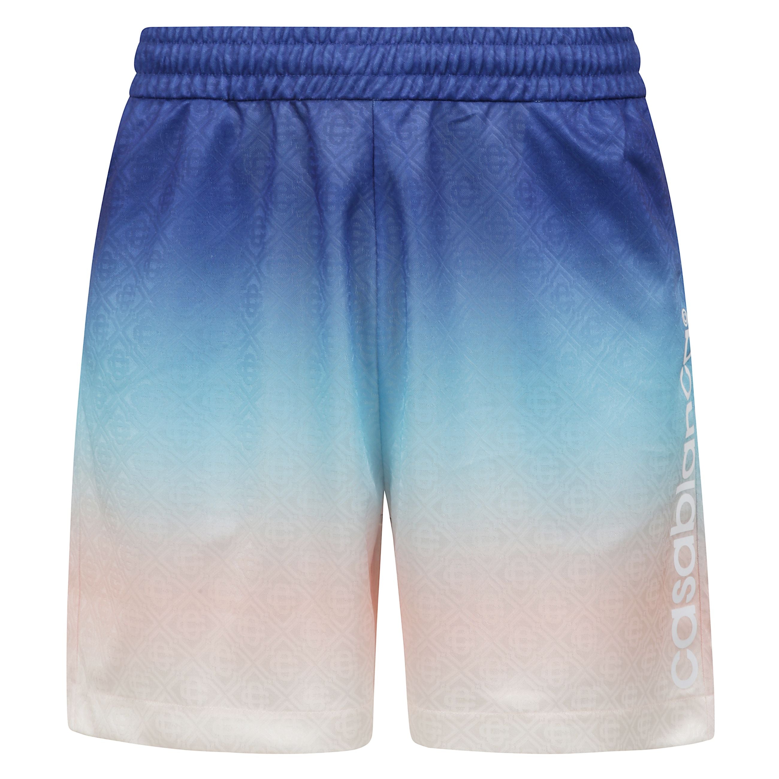 I pantaloncini da calcio gradient sono un design sportivo caratterizzato da una serie di colori sfumati che enfatizzano i temi fondamentali. realizzato in tessuto jacquard monogram in poliestere con il logo casablanca sul fianco. completa di vita elastici