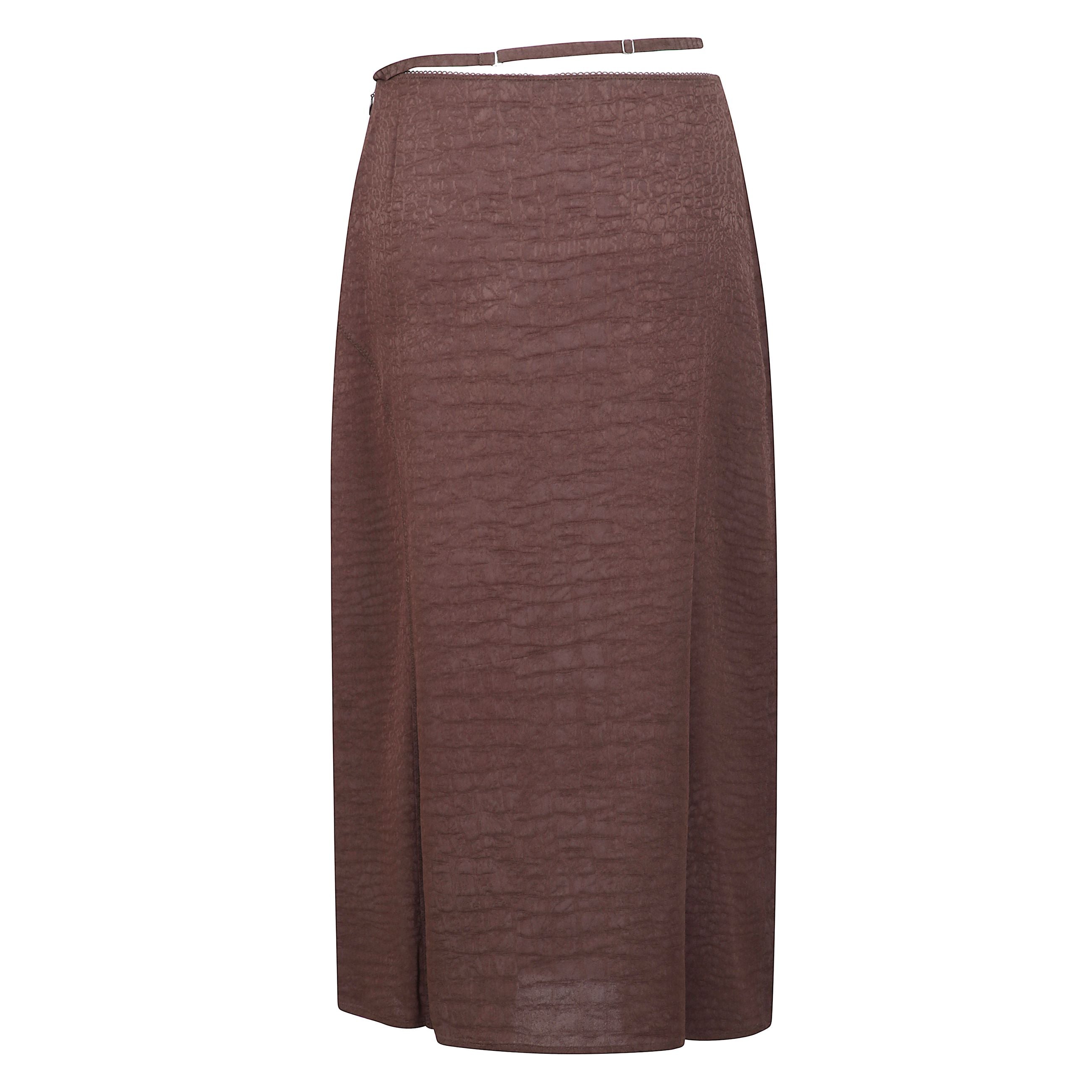 La gonna notte con charm jacquemus.