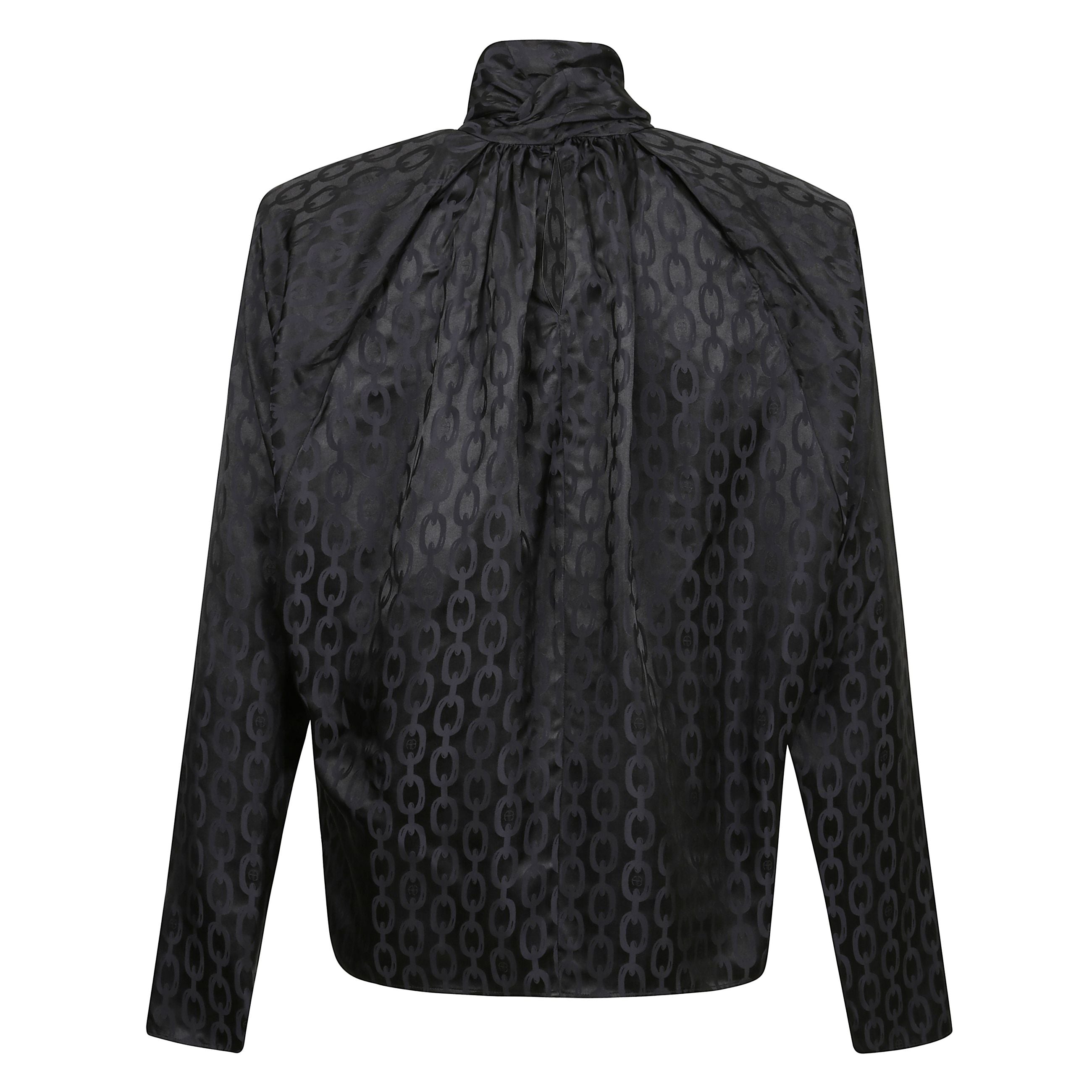 Il top rachel ha spalline rimovibili Ã¨ realizzato in una miscela di seta-rayon da 21 mm con un jacquard a maglia personalizzato. questo separatore femminile presenta un lungo papillon al collo, maniche raglan che si restringono al polsino.
il top rachel 