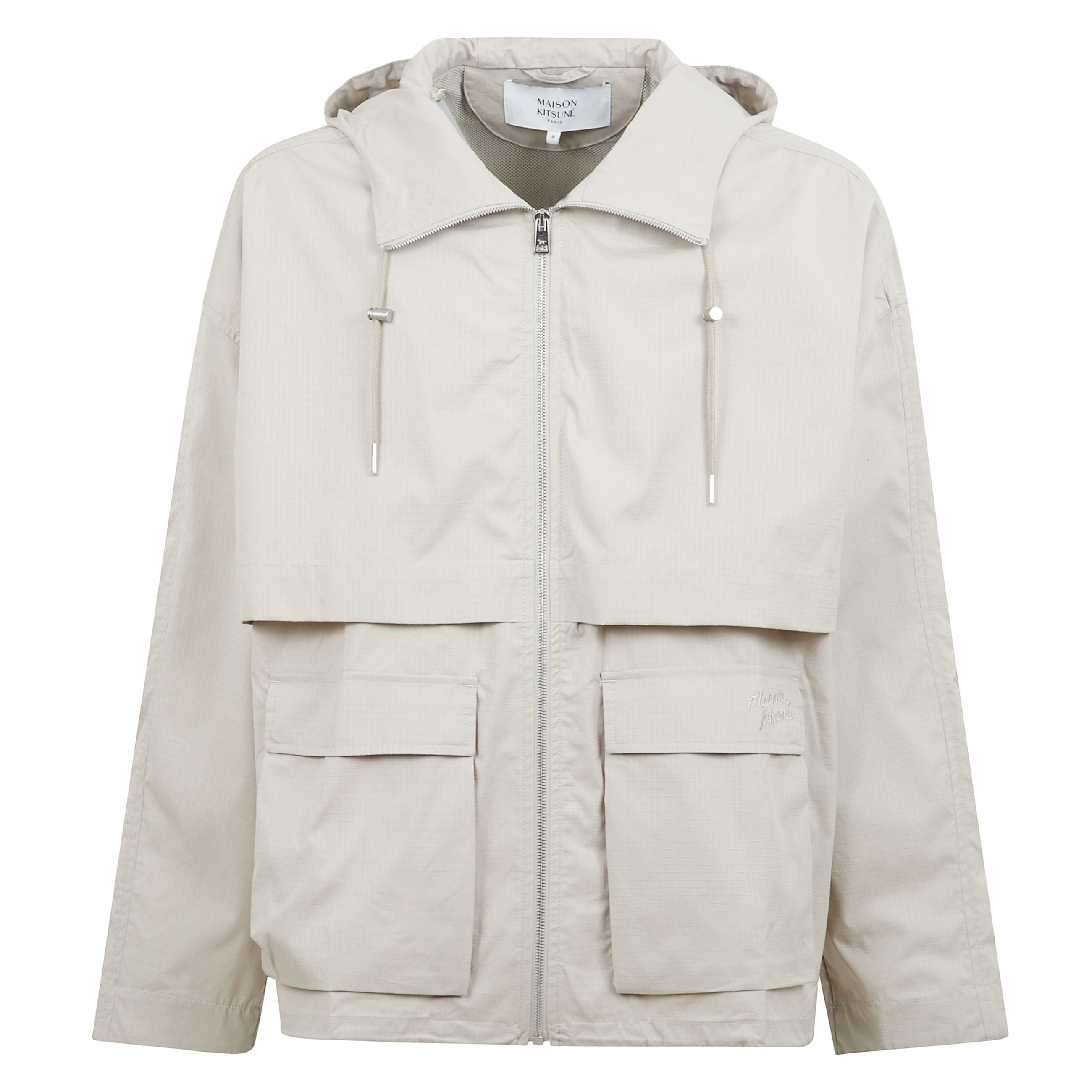 Giacca a vento con cappuccio e zip.