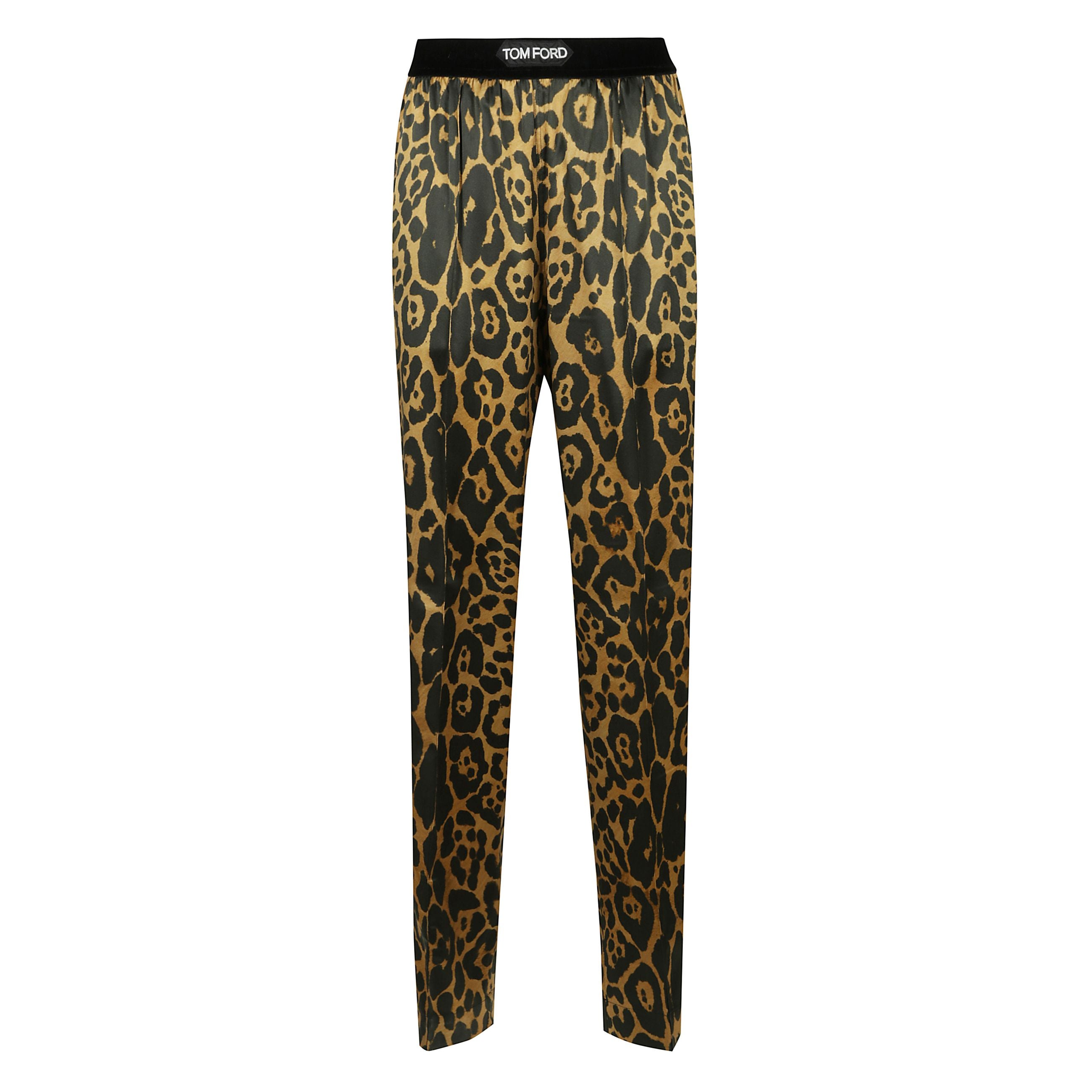 Pantaloni con stampa animalier, vita elasticizzata in velluto con logo, due tasche laterali oblique e due tasche posteriori applicate