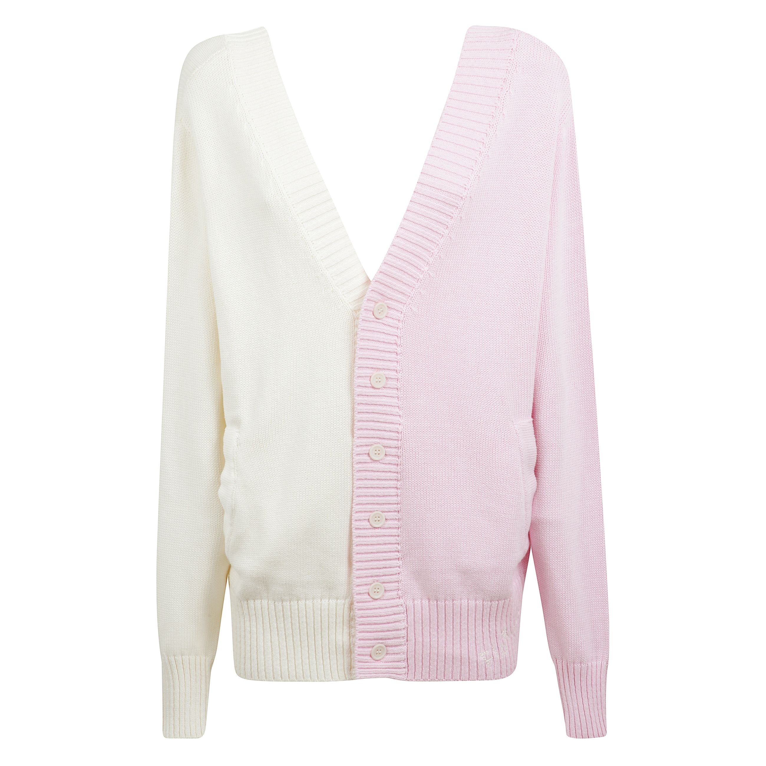 Cardigan composto da due cardigan di colore diverso, uniti da bottoni sul davanti e sul retro. presenta un profondo scollo a v, spalle scese e orlo a coste.