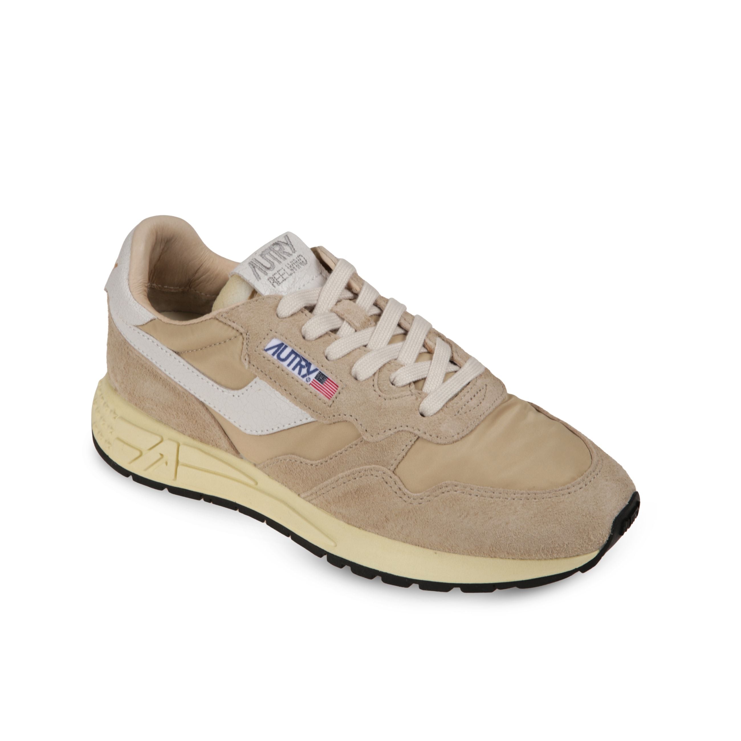 Sneakers autry reelwind. struttura in pelle e nylon con inserti in suede. talloncino ed inserti laterali in pelle con lieve effetto vintage.
