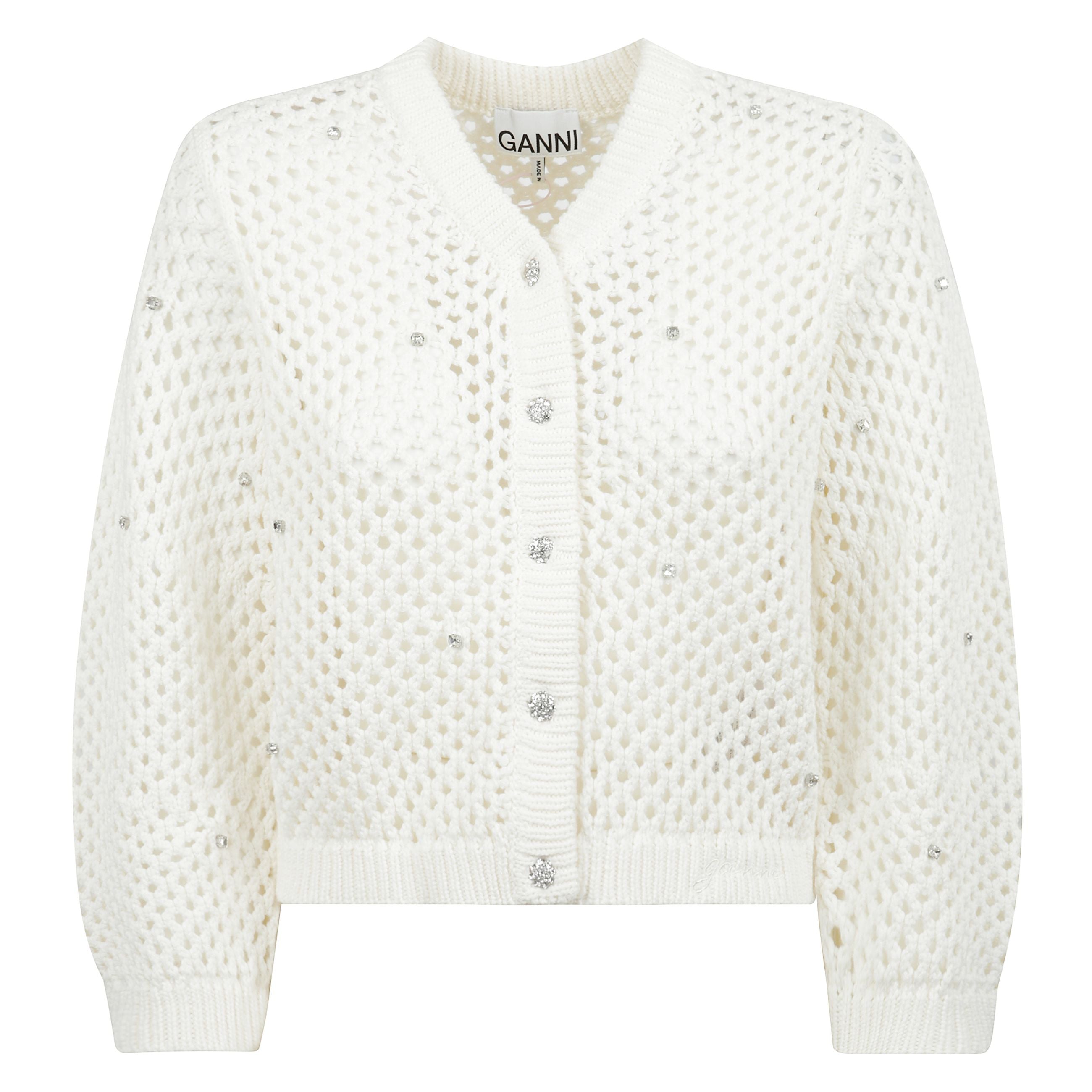 Cardigan in cotone traforato con strass color bianco sporco presenta uno scollo a v, una chiusura con bottoni sul davanti e dettagli in strass.