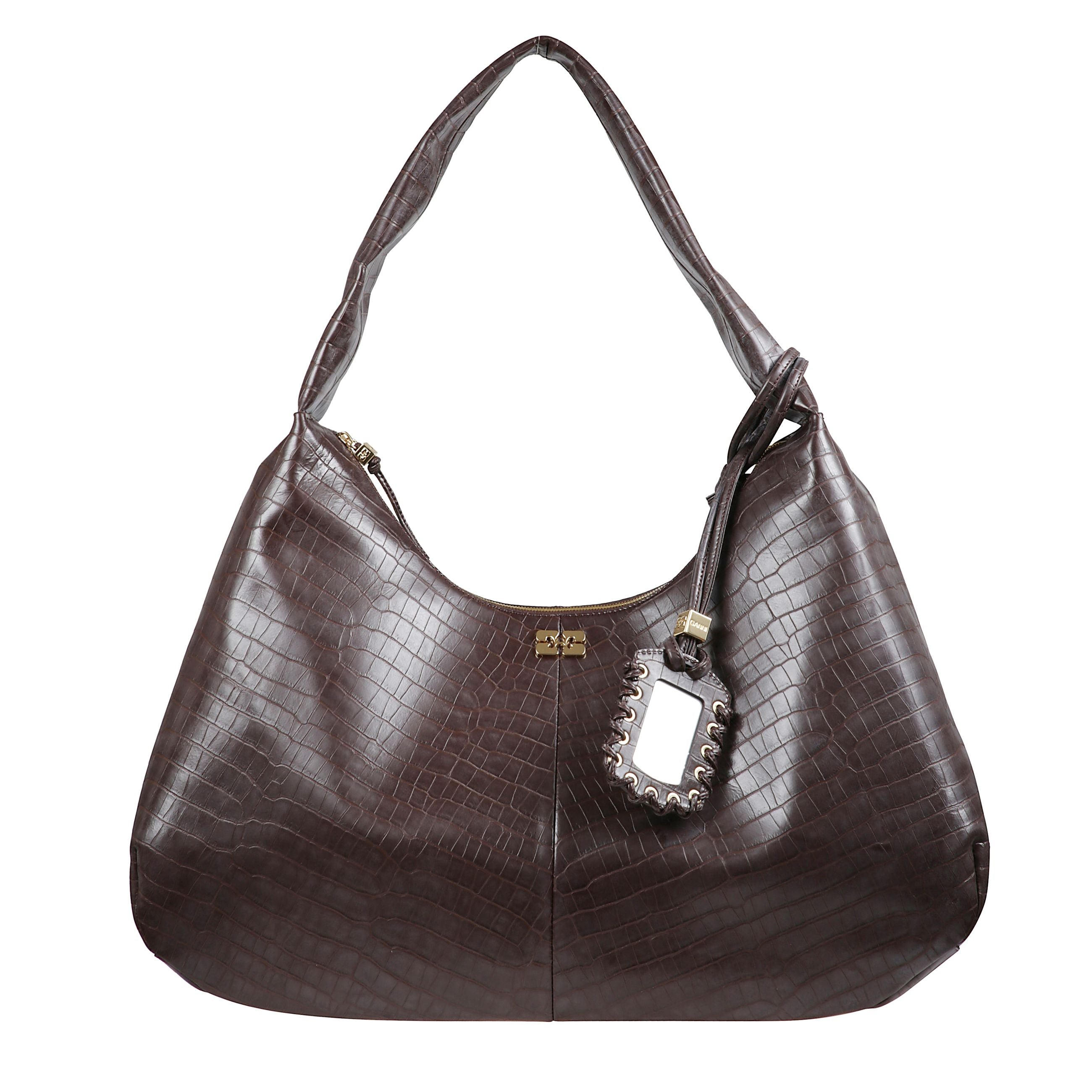 Borsa extra large in pelle. manico superiore annodato. tracolla staccabile e regolabile. chiusura magnetica superiore. placchetta con logo ganni sul fronte.