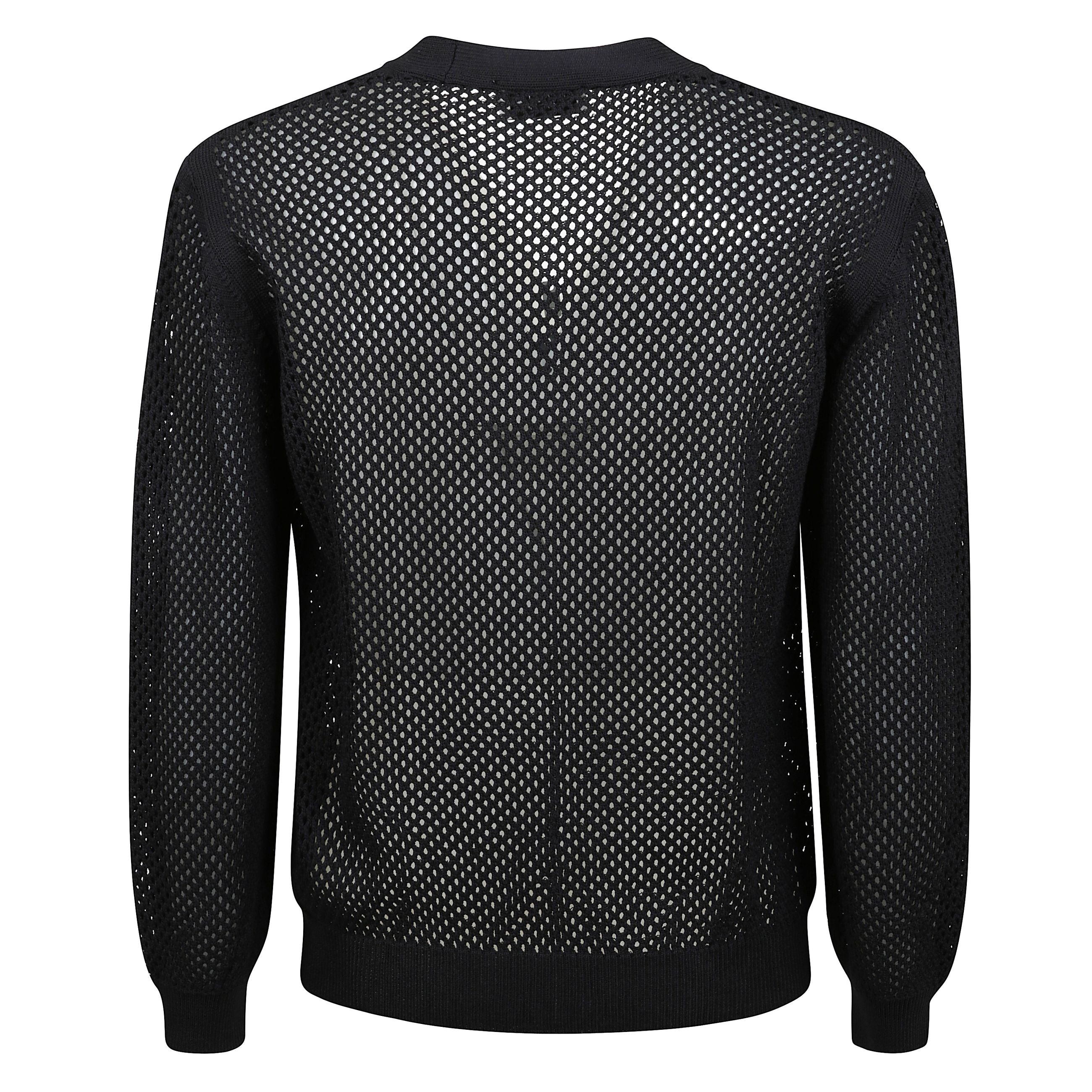 Cardigan oversize in maglia caratterizzata da lavorazione in punto rete. presenta una silhouette oversize con chiusura frontale a 4 bottoni.