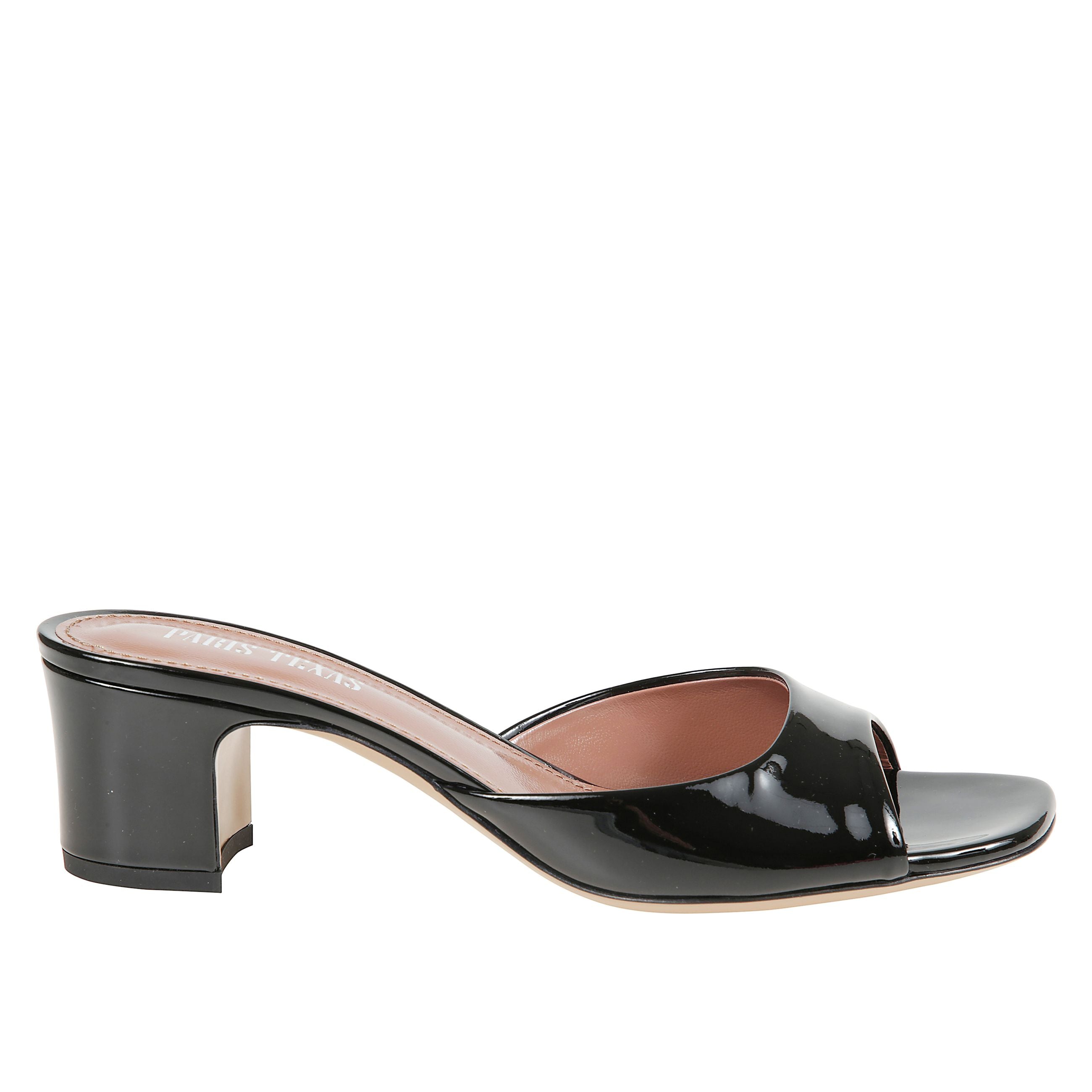 Mules open-toe in vernice. tacco chunky rivestito.
