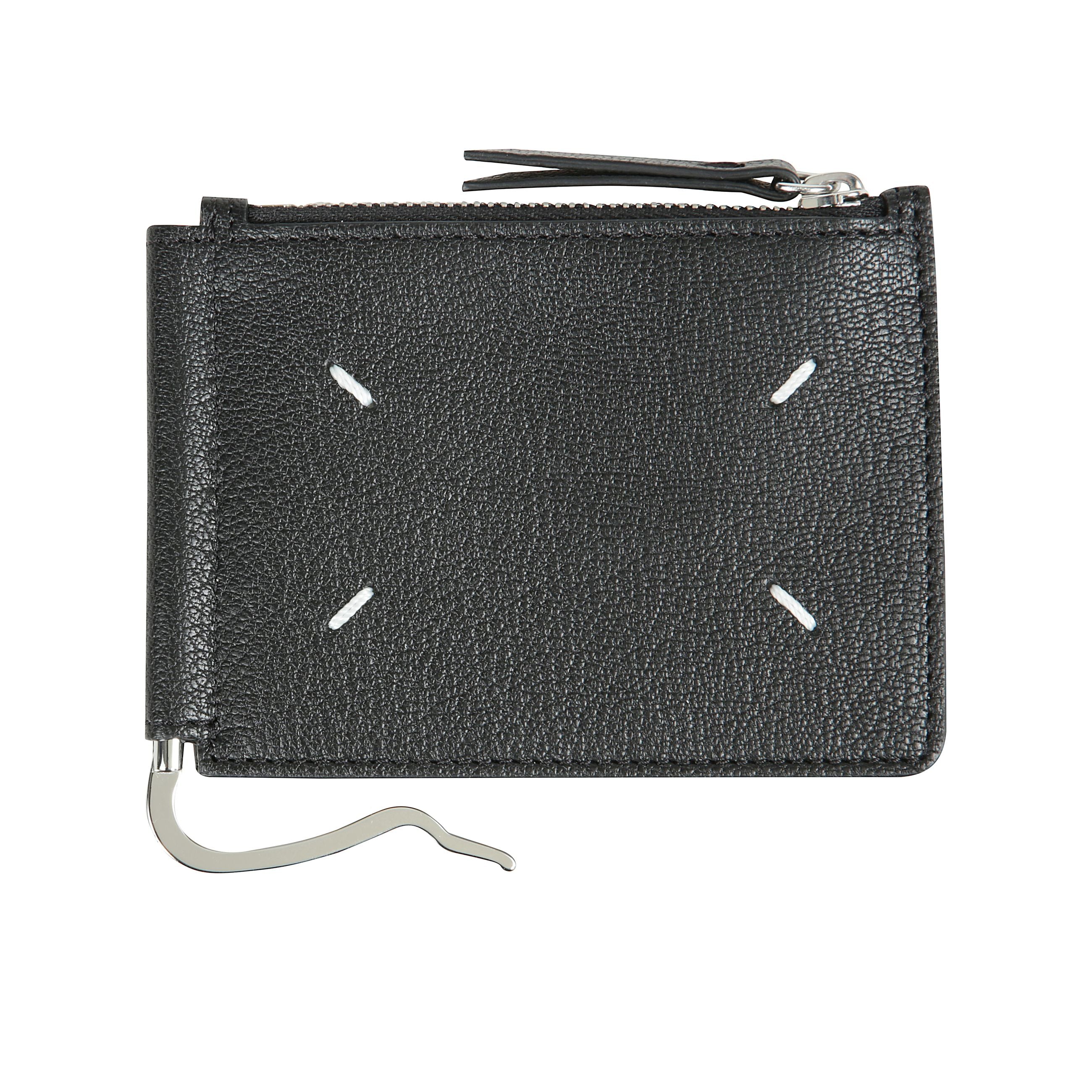 Portafoglio con quattro punti di cucitura in pelle.