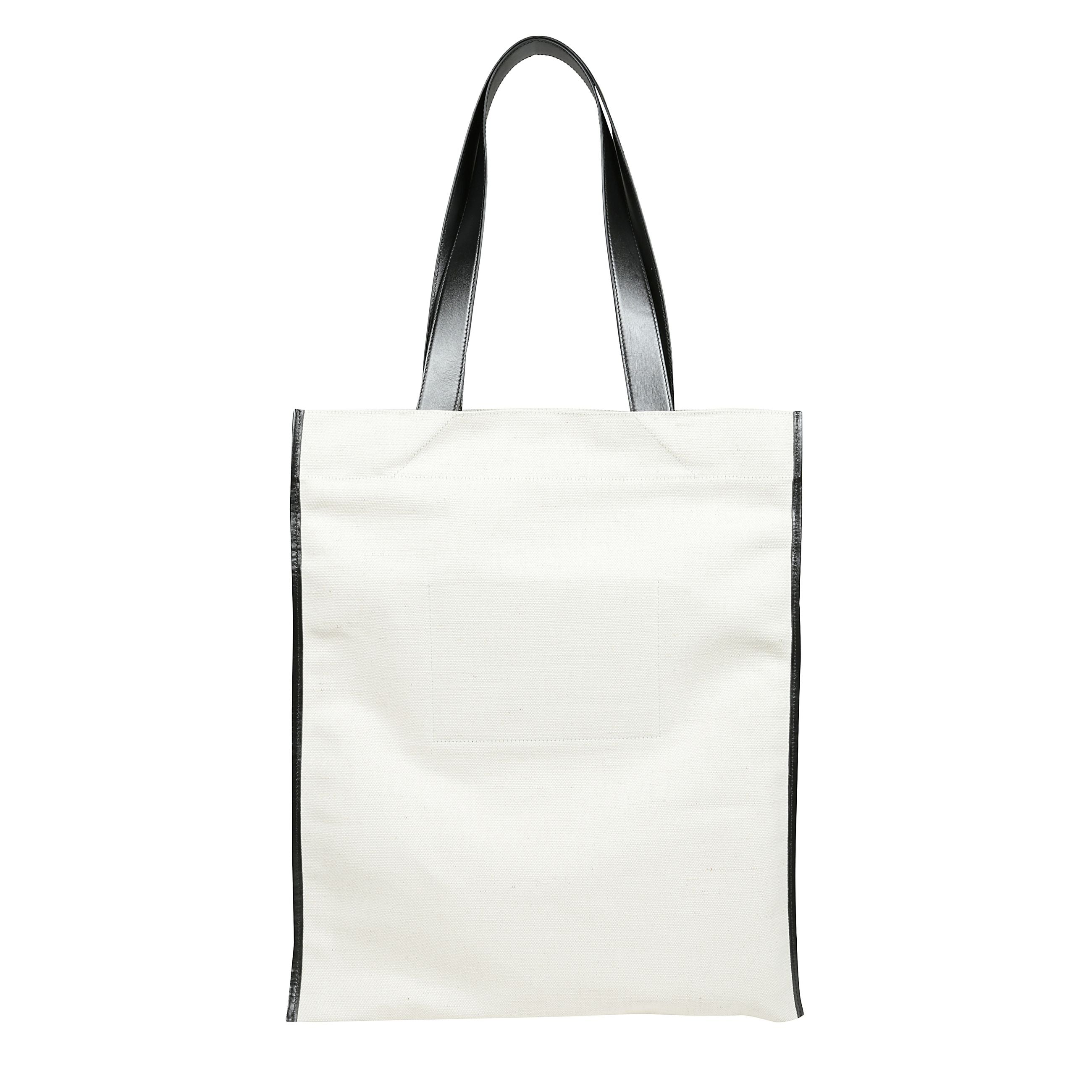 Borsa shopper media in misto cotone beige e nero con design rettangolare, ha due manici in pelle sulla parte superiore, una 
tasca interna in pelle con lo scomparto interno per banconote
in tela in lino e cotone, stampa logo sul davanti.