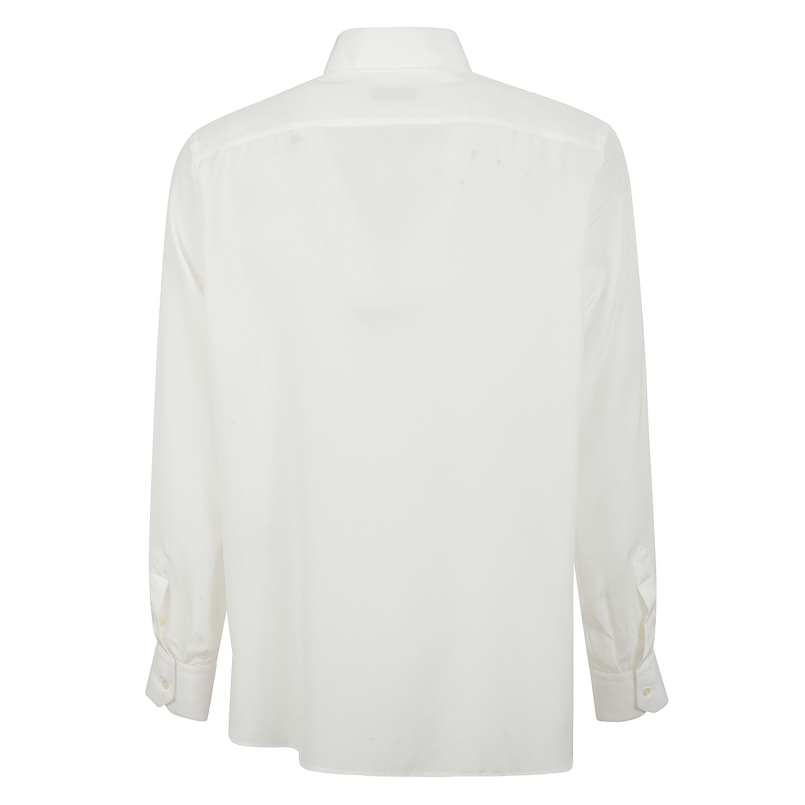 Camicia in seta crepe de chine camicia Ã¨ realizzata in crepe de chine di seta con finitura leggera e presenta una silhouette comoda a maniche lunghe, unâabbottonatura frontale nascosta da fessino e un colletto all'italiana