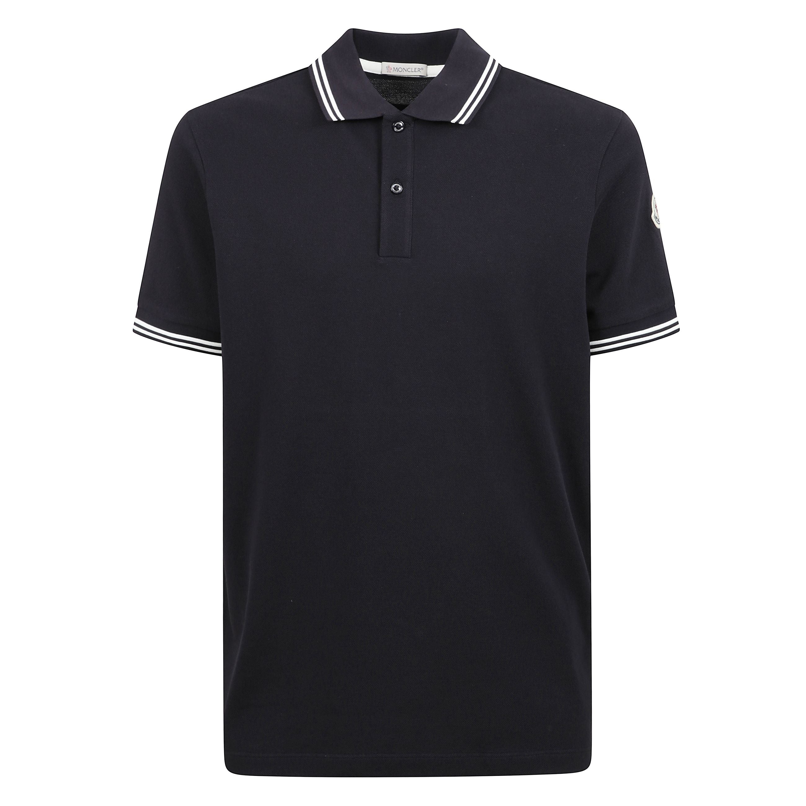 Polo in cotone piquet con orlo a righe