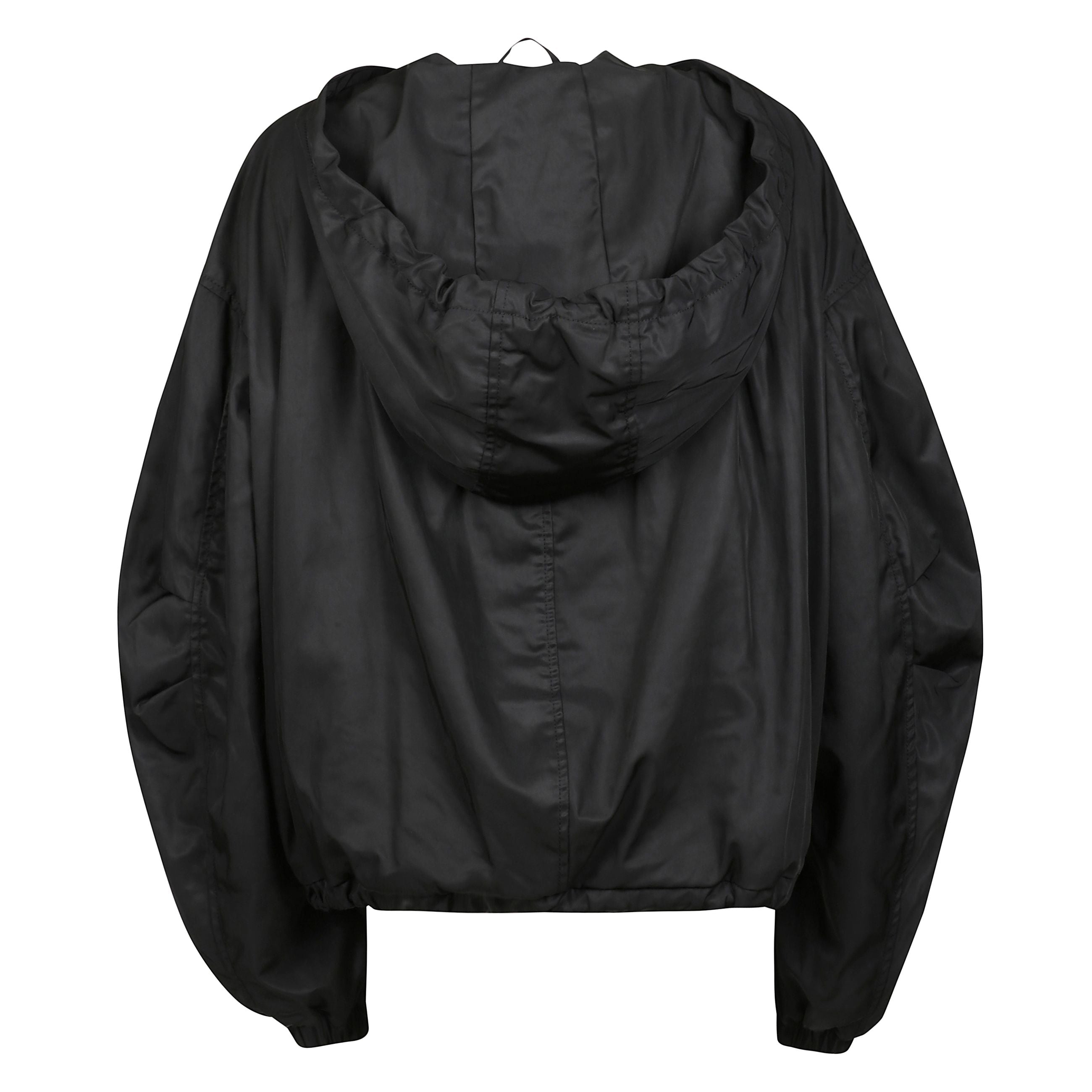 La giacca bomber oversize di the attico rappresenta il perfetto equilibrio tra stile urbano e sofisticatezza contemporanea. caratterizzata da un design avvolgente con linee geometriche e dettagli sartoriali, questa giacca Ã¨ realizzata in tessuto tecnico 