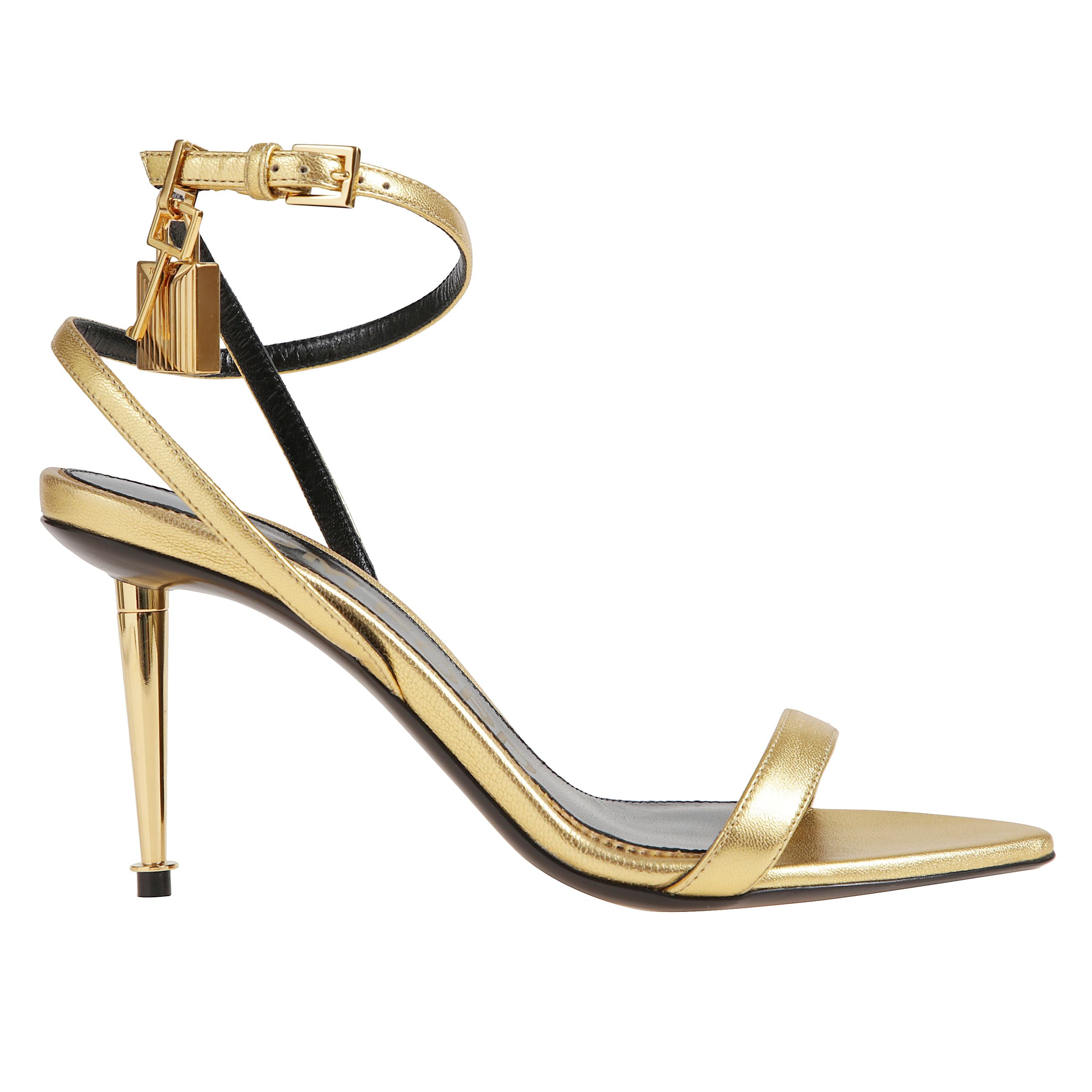 DÃ©colletÃ© in pelle con punta affusolata. cinturino alla caviglia regolabile e tacco a spillo in metallo. interno e soletta con firma tom ford impressa. dettaglio iconico con lucchetto metallico sul cinturino.